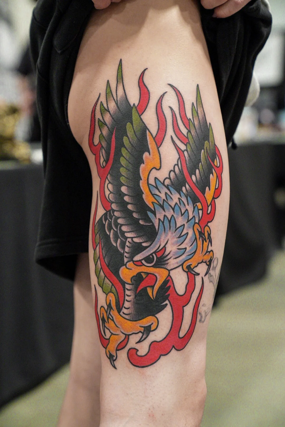 Traditional tattoo by Don Don: eagle, flames, animal, nature