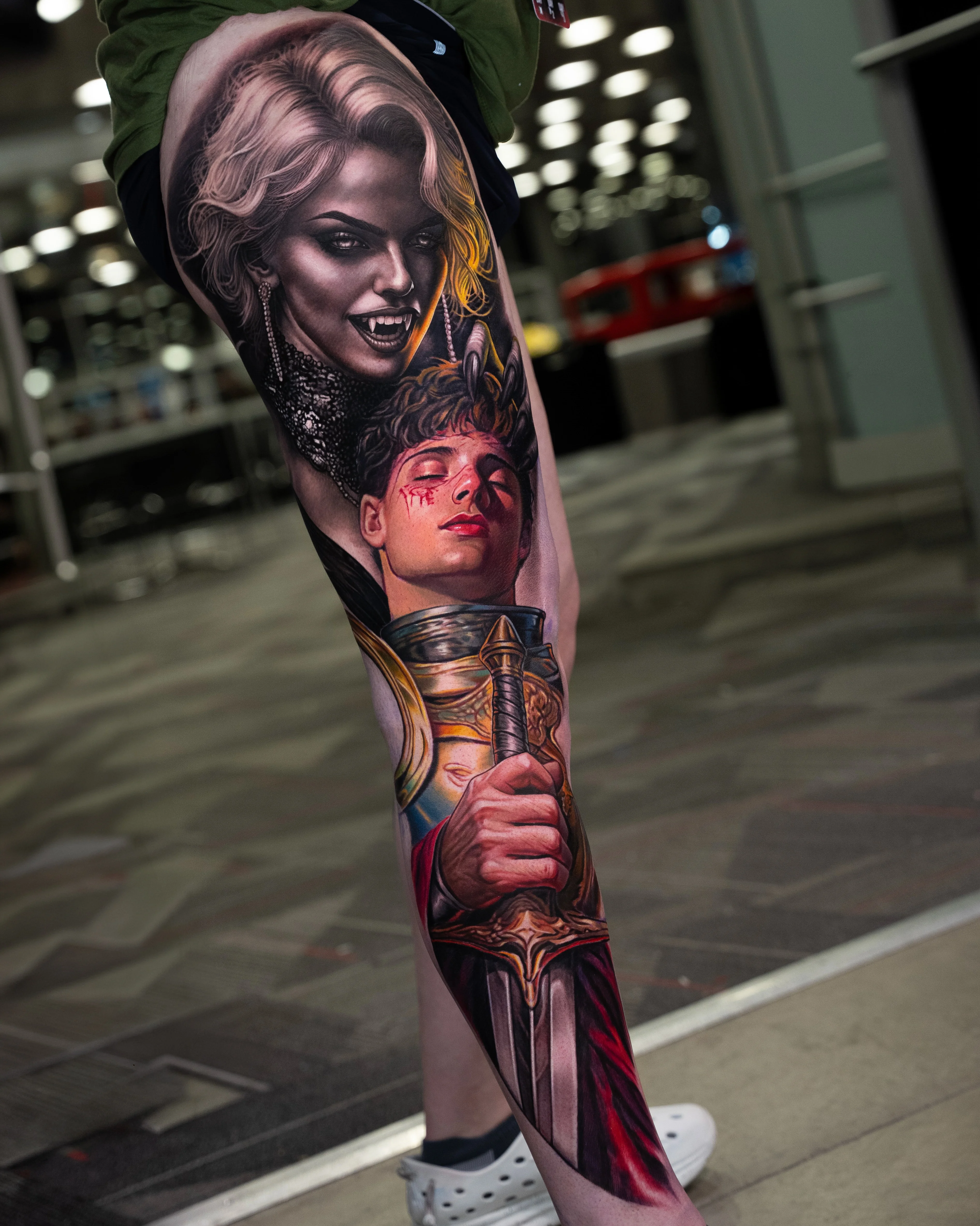 Color Realism tattoo by Gara: vampire woman, man, sword, armor