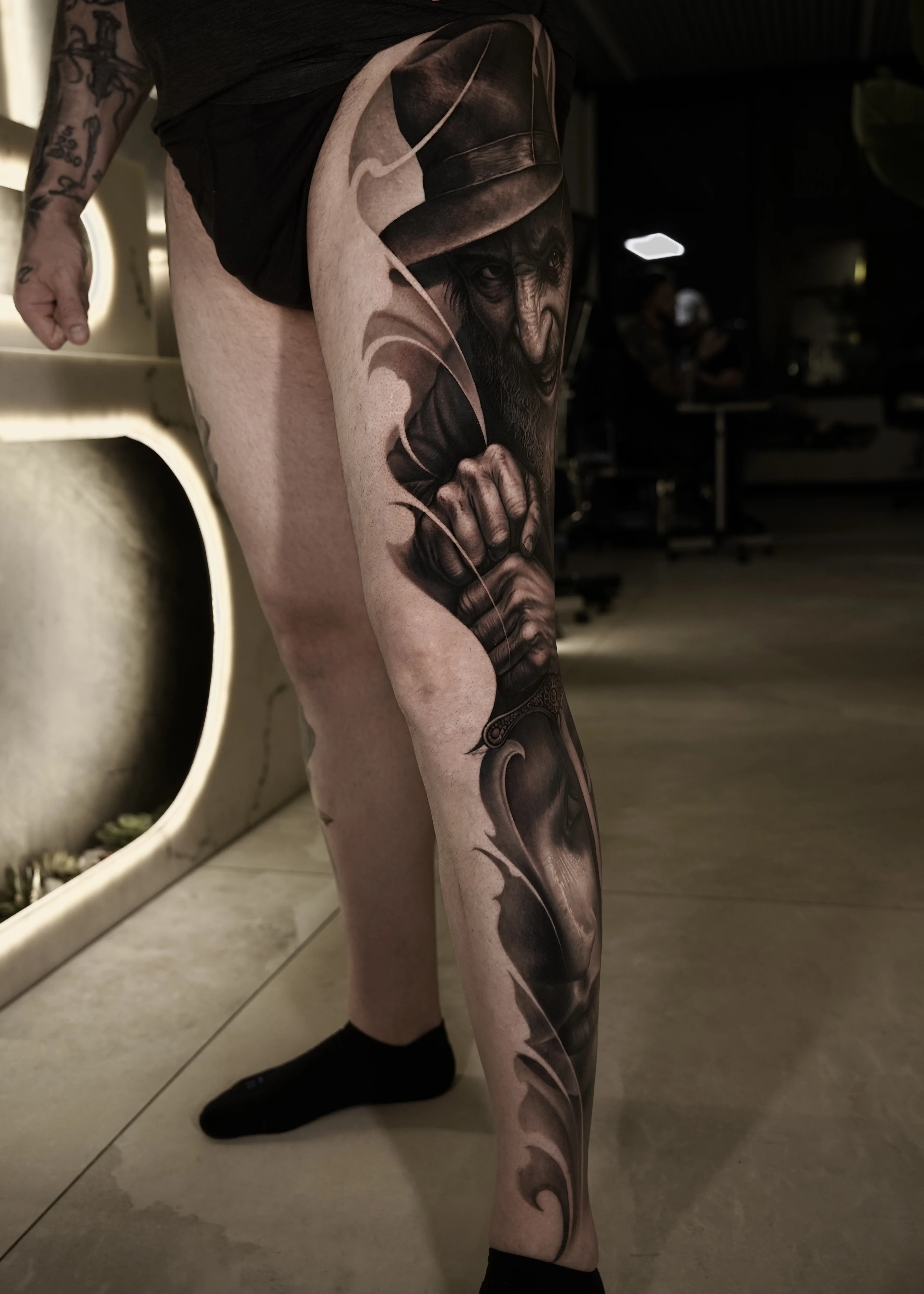 Black & Gray Realism tattoo by Gara: old man, hat, hand, face