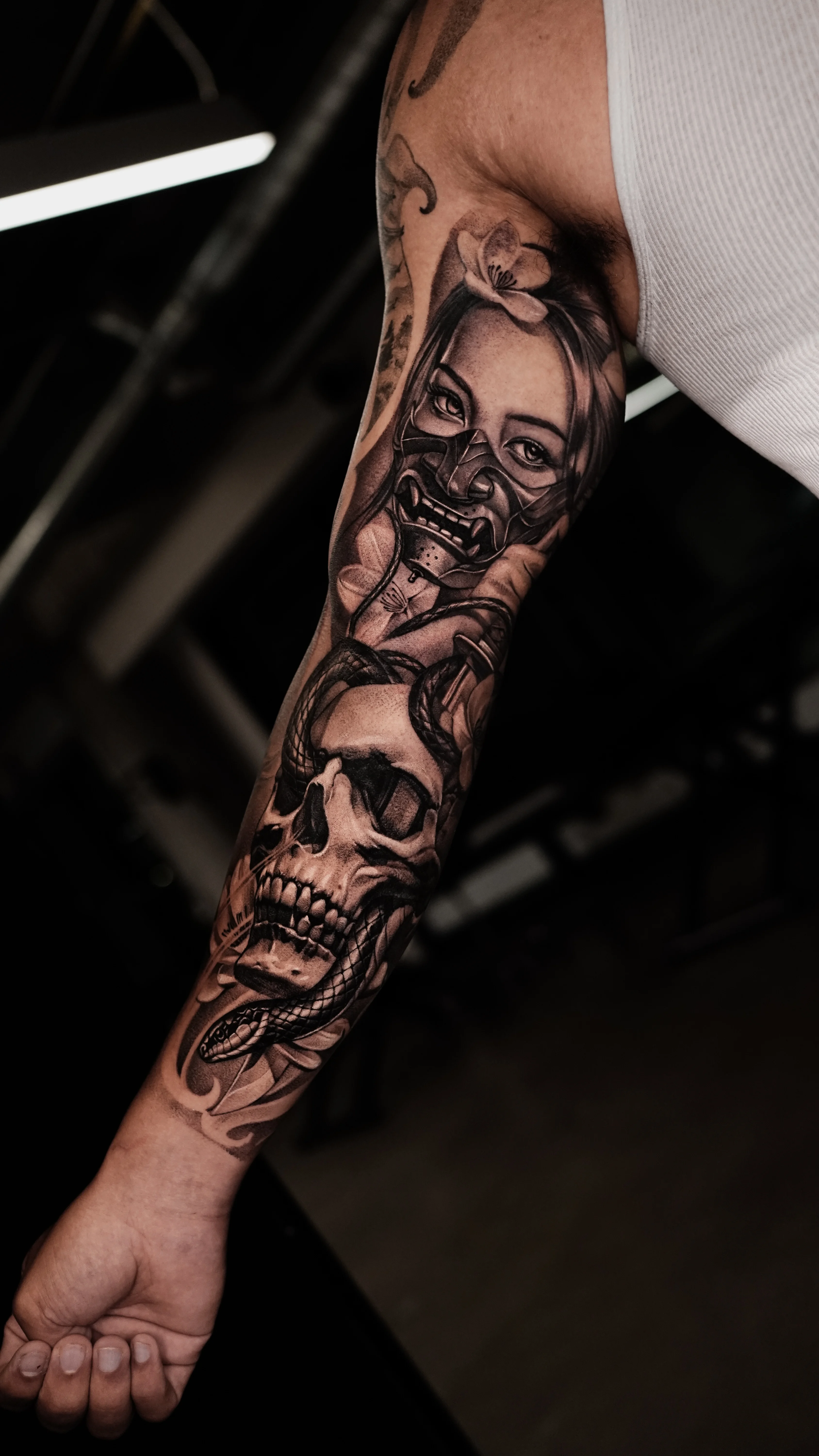 Black & Gray Realism tattoo by MK tattoo: woman, demon mask, flower, skull