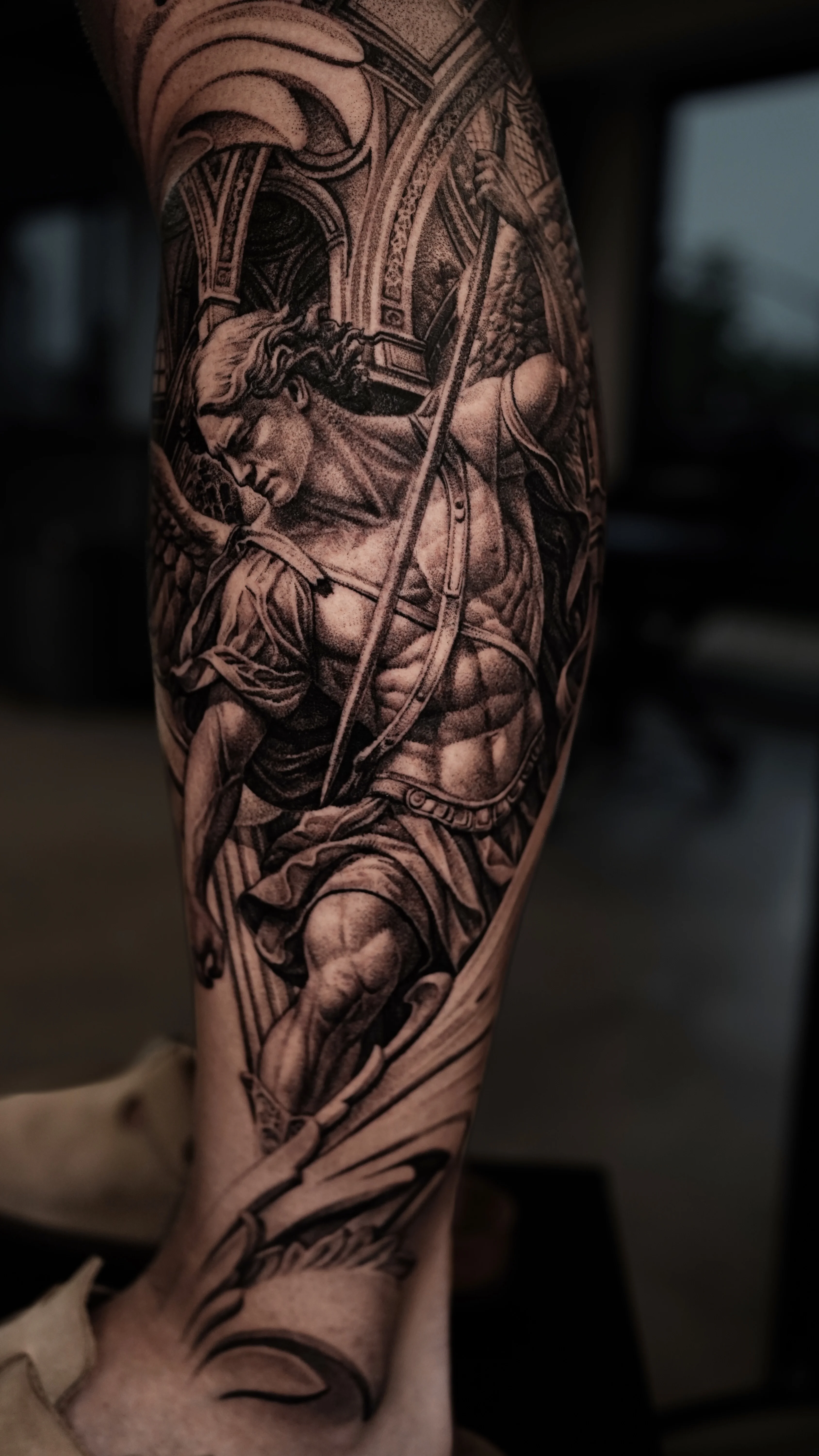 Black & Gray Realism tattoo by MK tattoo: angel, muscular man, wings, arch