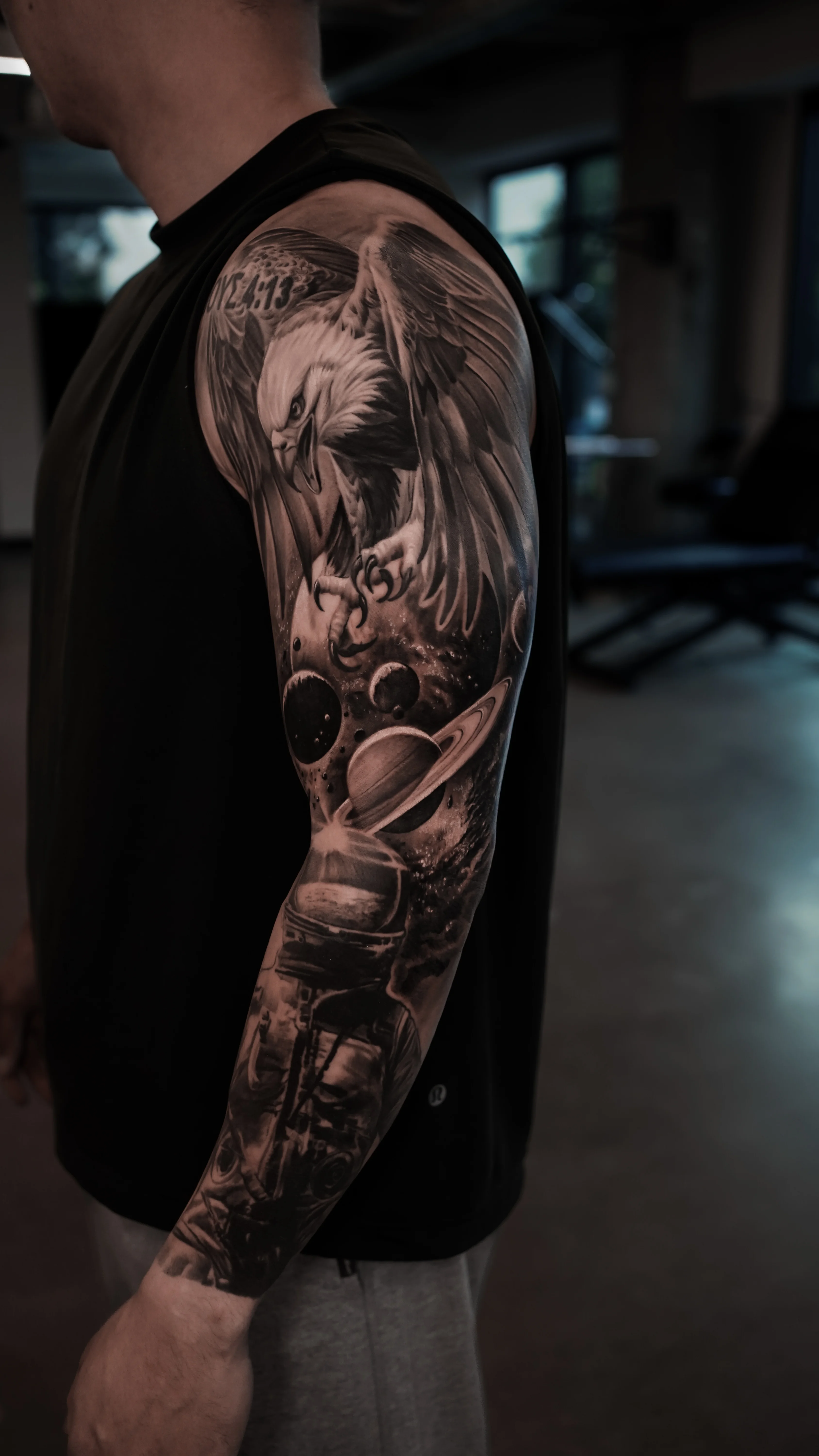 Black & Gray Realism tattoo by MK tattoo: eagle, planets, saturn, space
