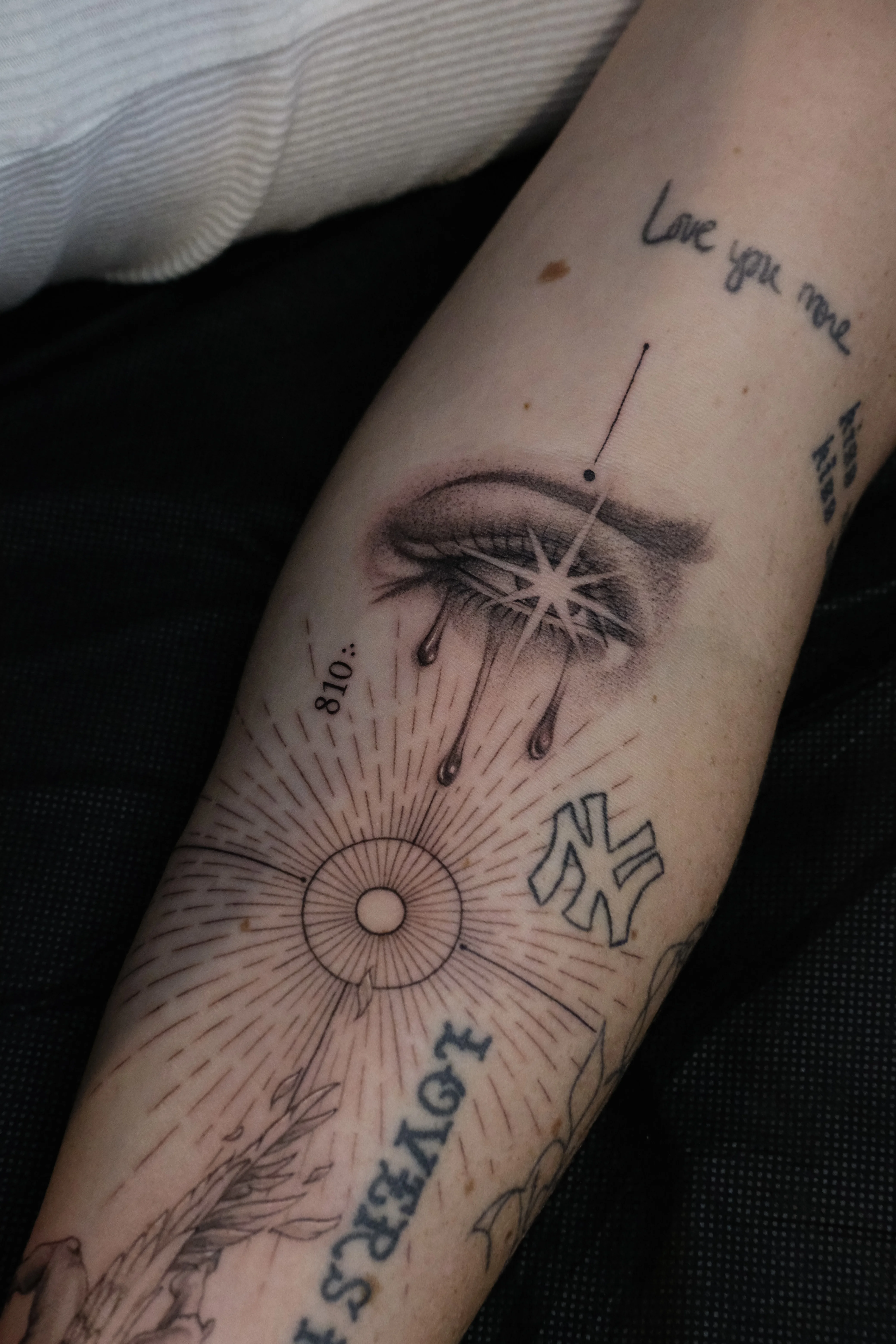 Black & Gray Realism tattoo by Abigail Louise: eye, tears, star, new york yankees logo