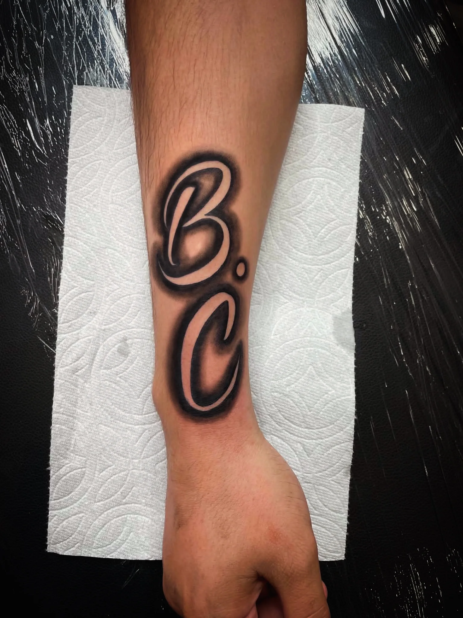 Blackwork tattoo by Jc_TheArtist: letter b, letter c, period, lettering