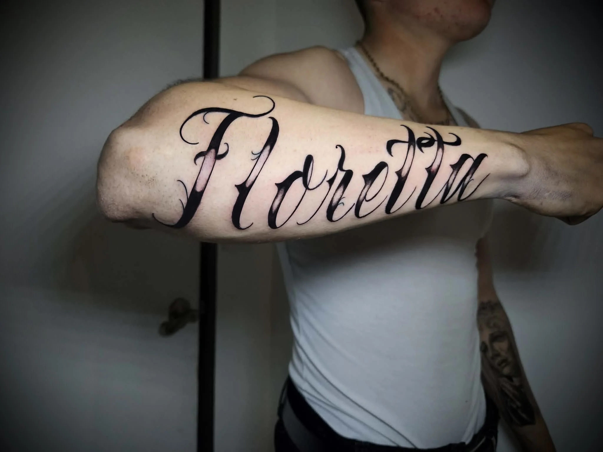 Blackwork tattoo by Jc_TheArtist: custom script, lettering, custom, masculine