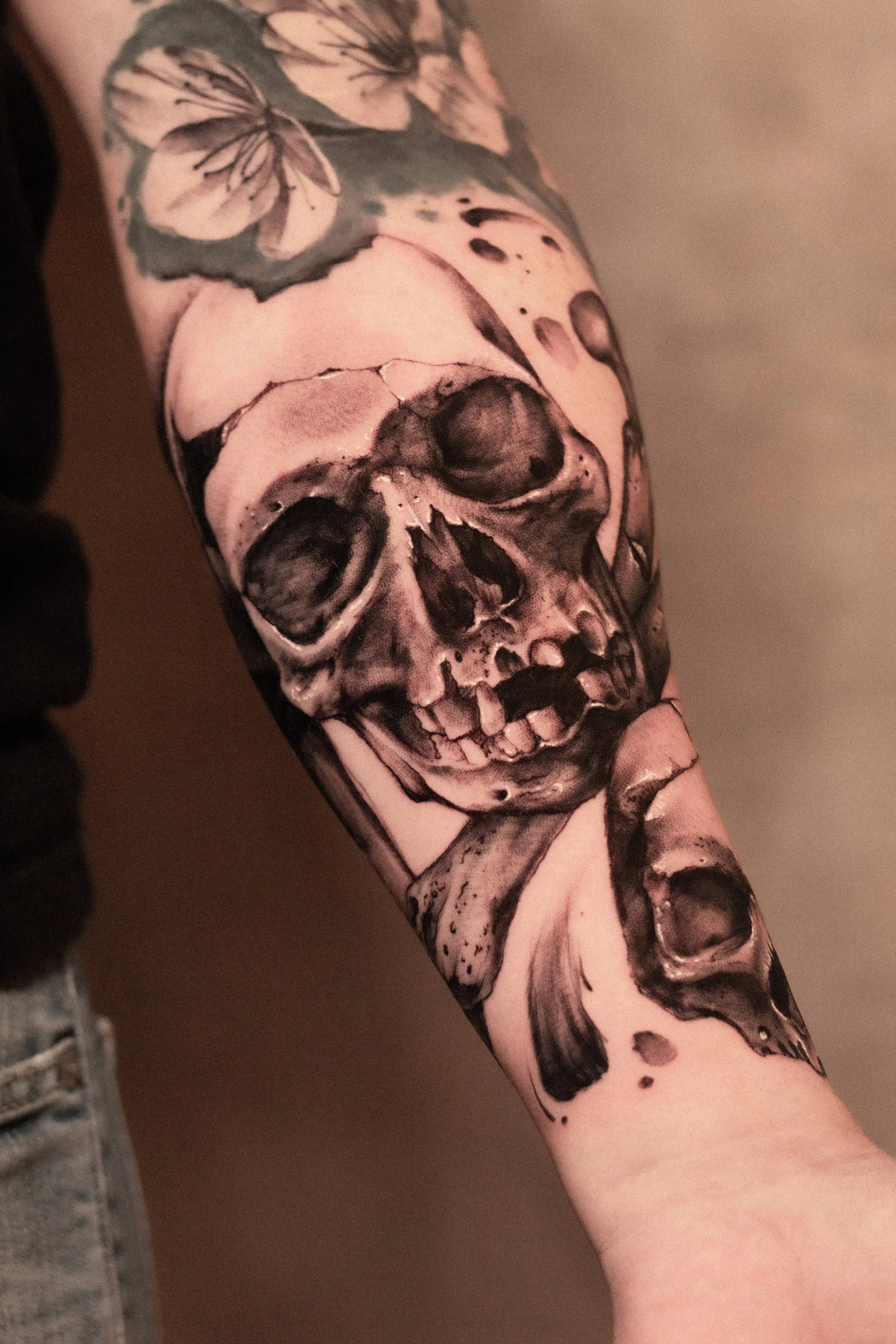 Black & Gray Realism tattoo by Emiliano Garrido: skull, flower, dark, gothic