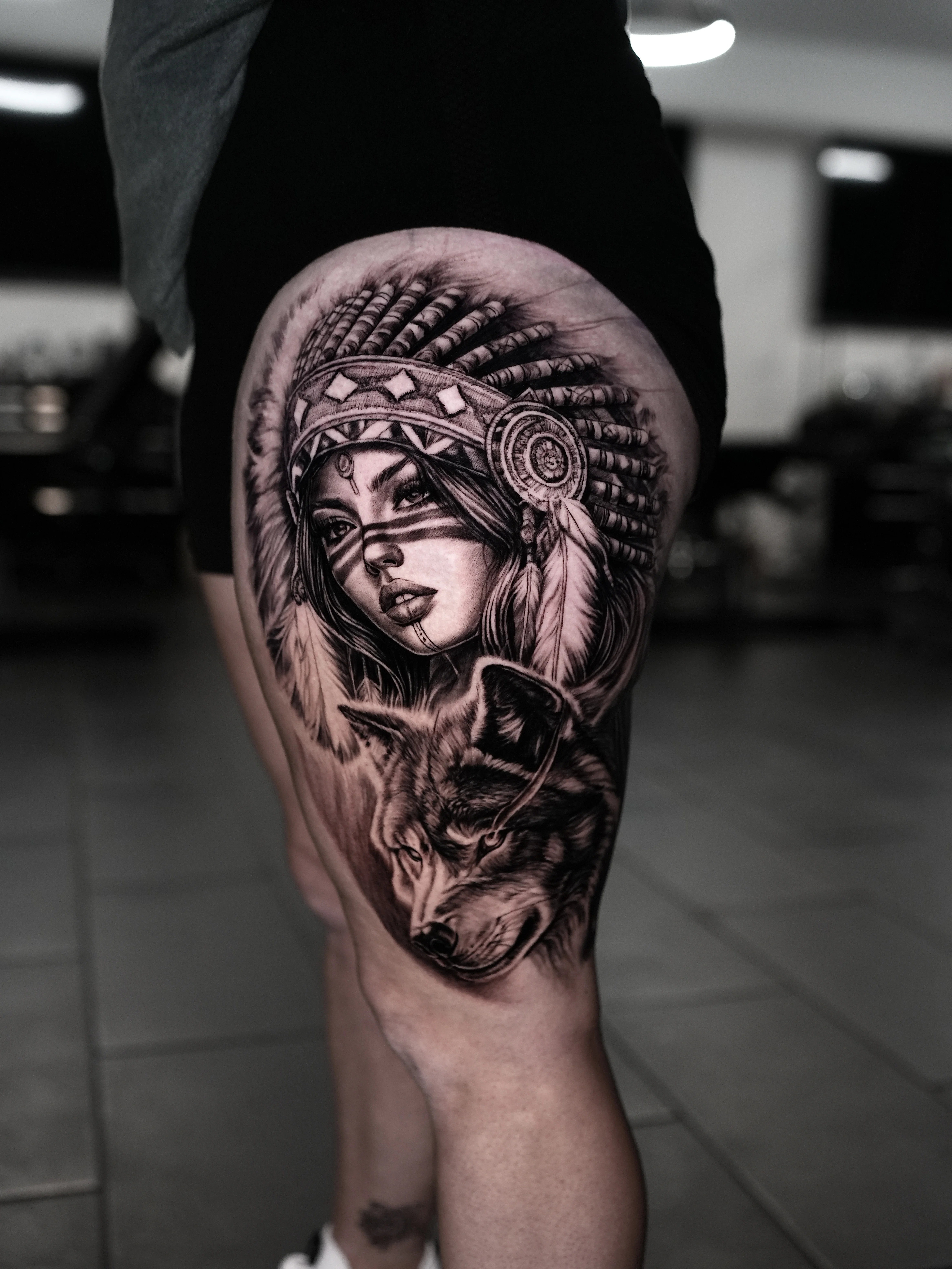 Black & Gray Realism tattoo by José Gregorio  Albornoz Márquez: woman, headdress, feathers, wolf