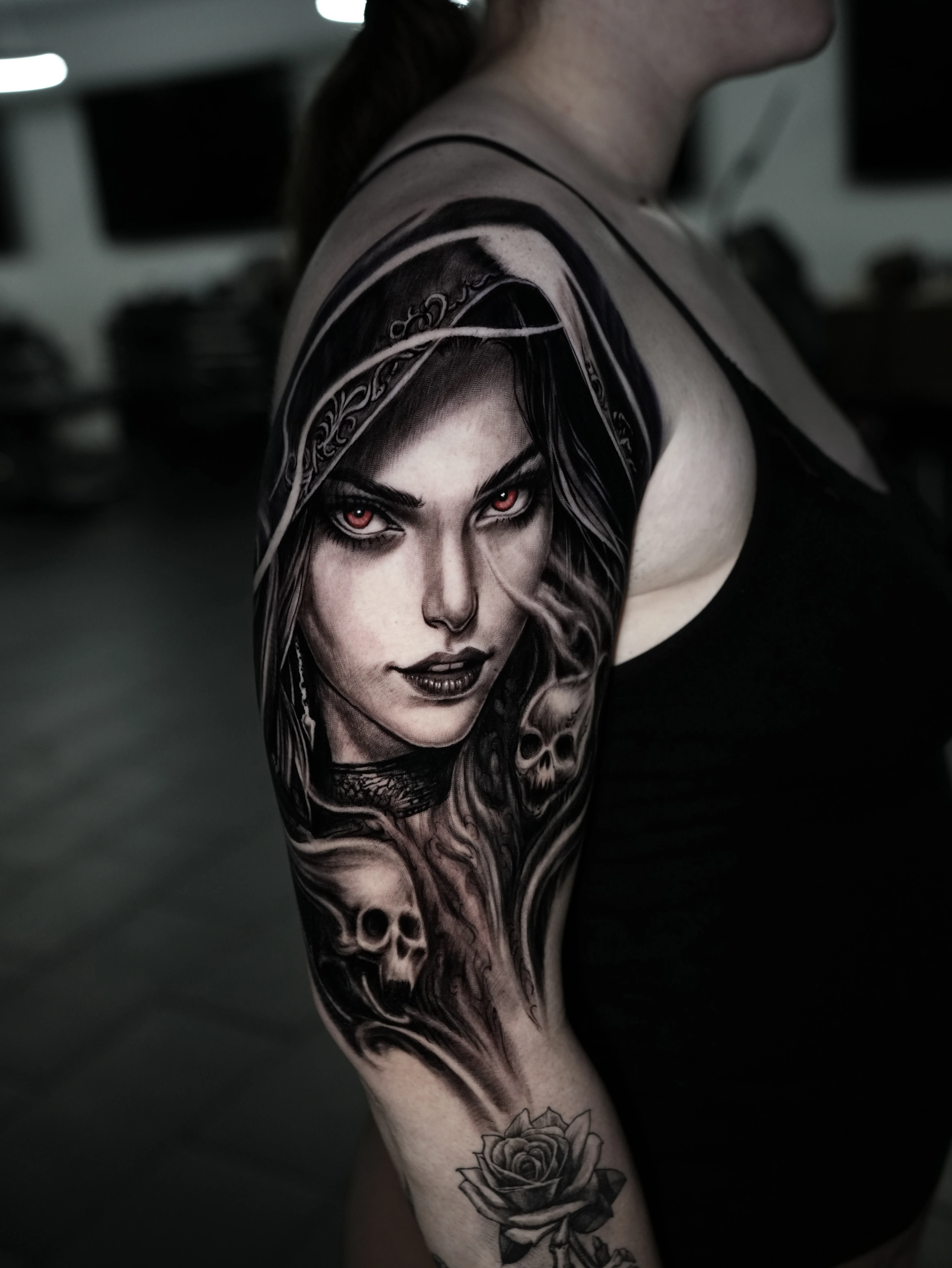 Black & Gray Realism tattoo by José Gregorio  Albornoz Márquez: woman, hood, skulls, rose