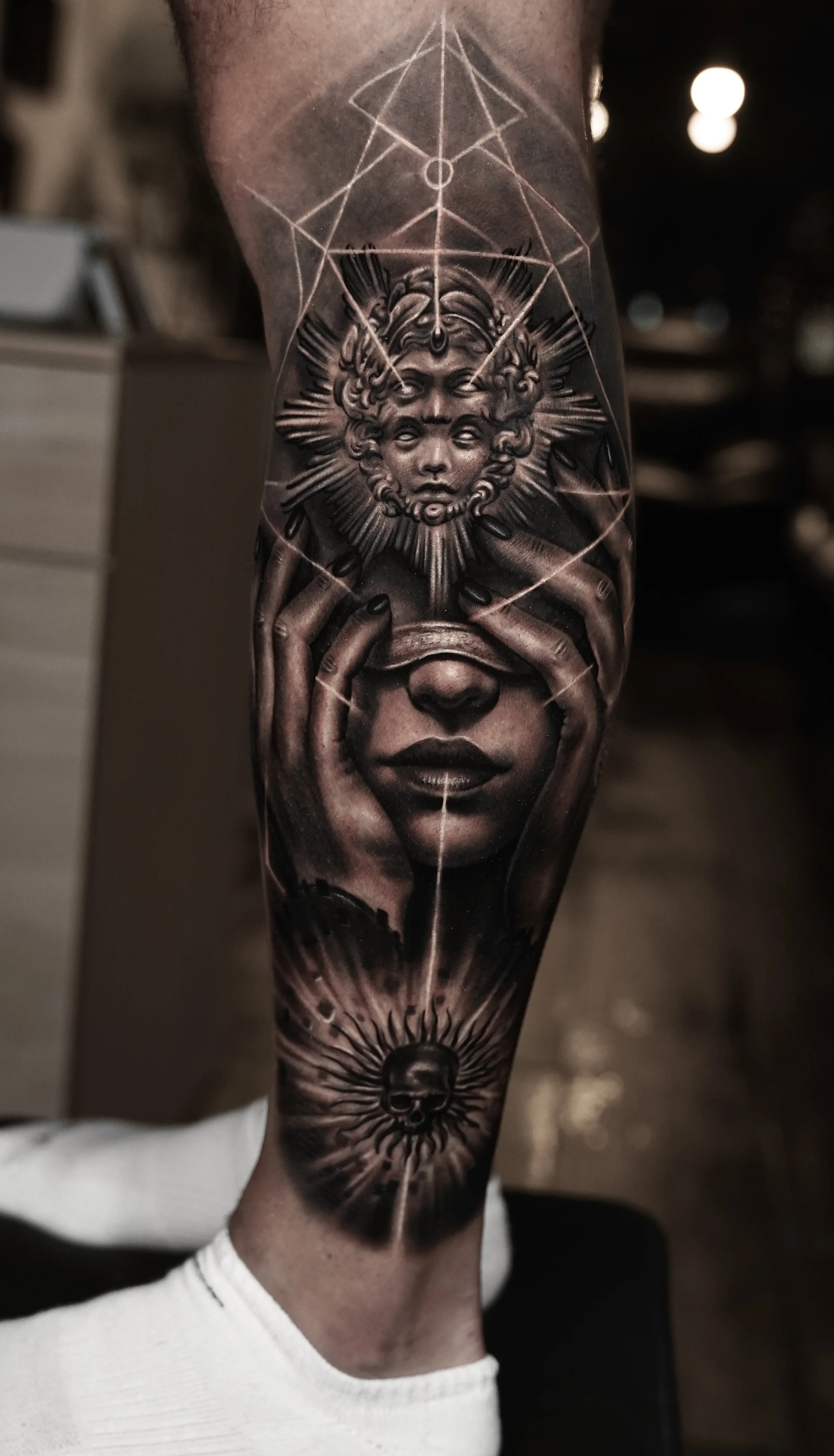 Mystical Face and Skull Calf: woman, hands, sun, skull, multi-faced head, dark