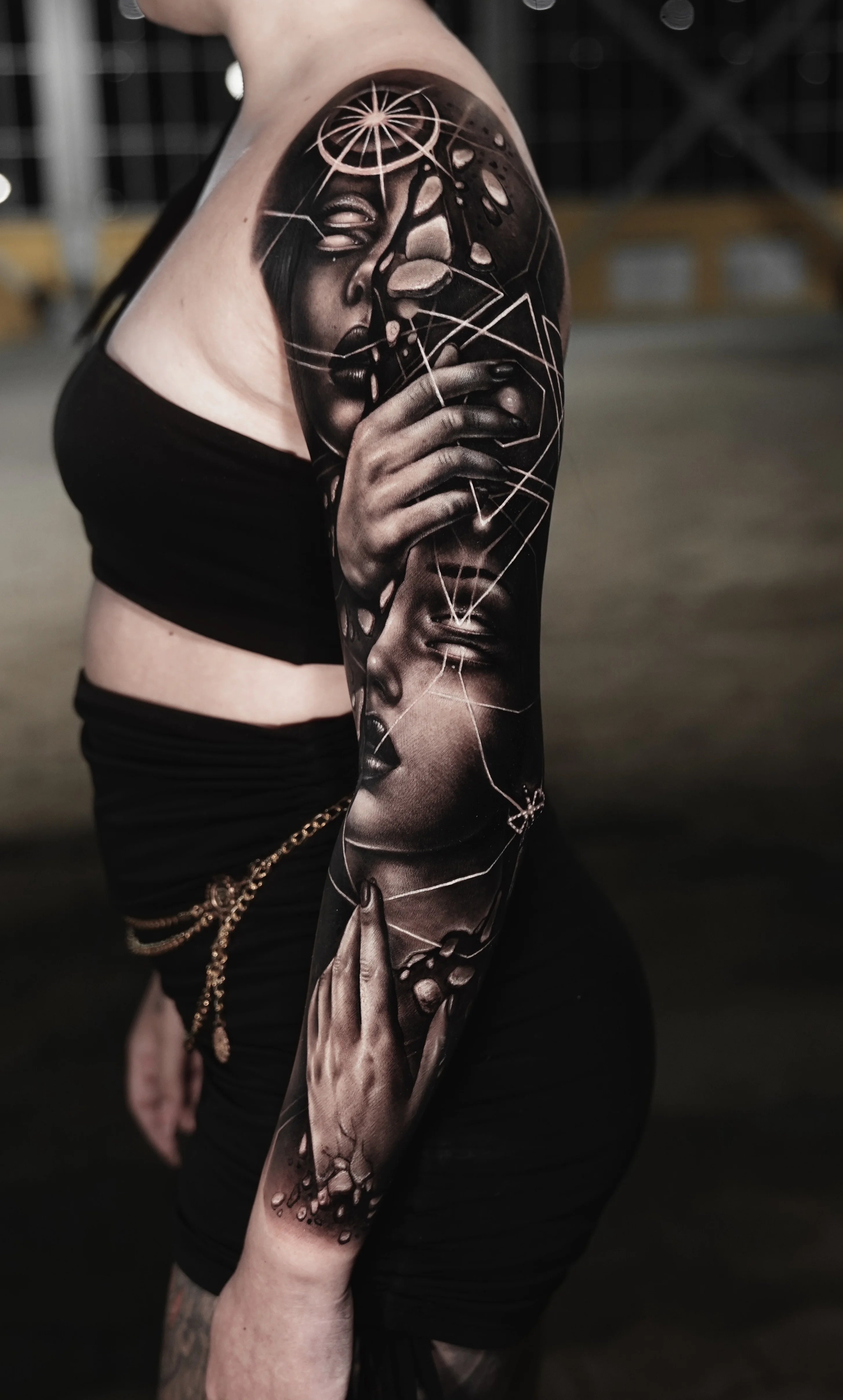Black & Gray Realism tattoo by Camilo Gonzalez: woman face, hands, geometric shapes, abstract lines