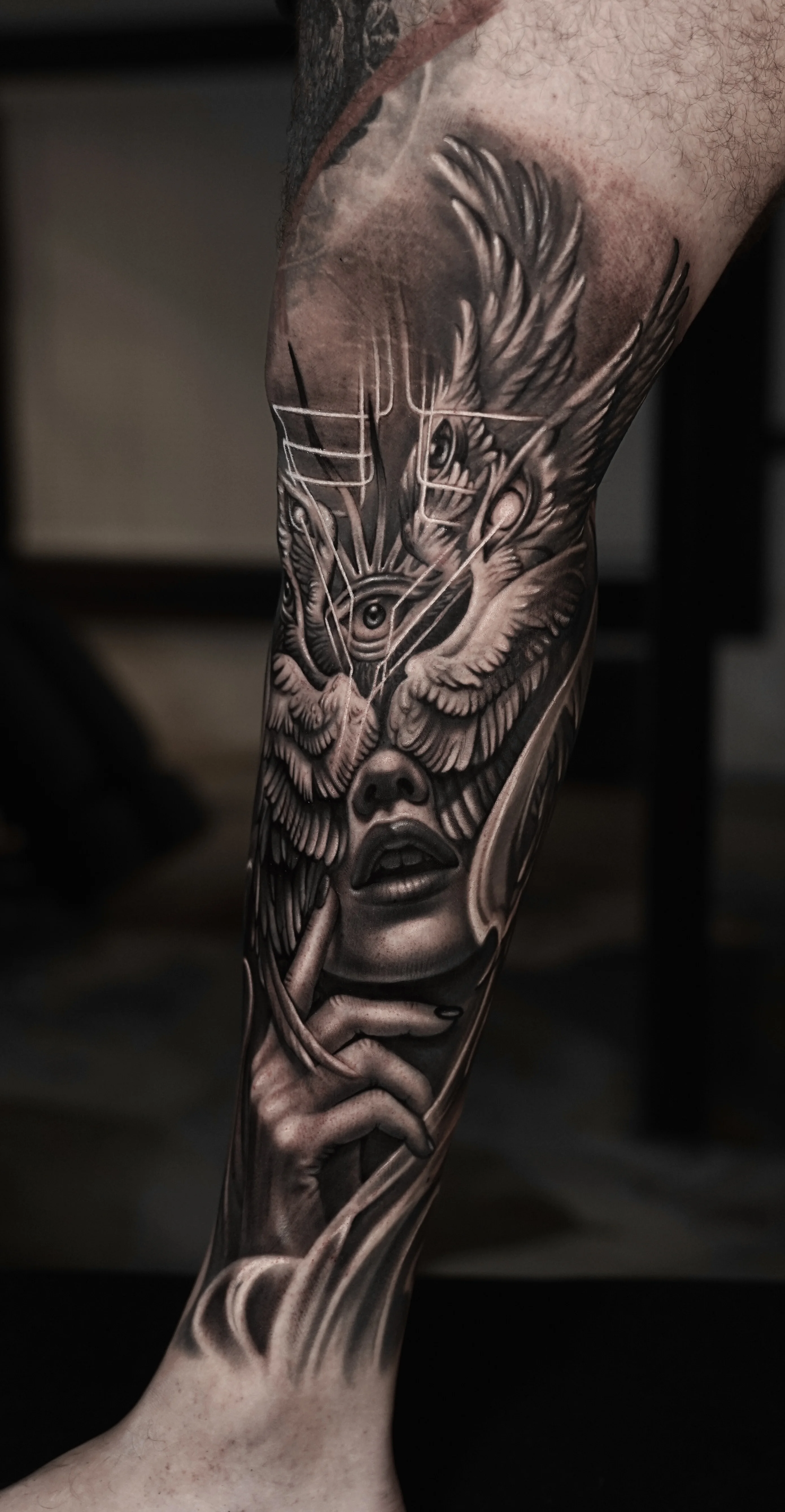 Black & Gray Realism tattoo by Camilo Gonzalez: woman, hand, eye, feathers