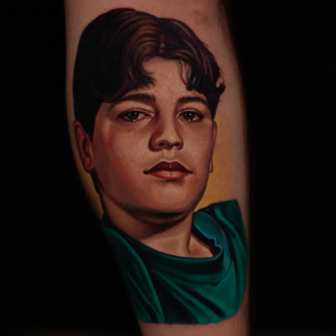 Color Realism tattoo by Nikko Hurtado: portrait, young man, face, shirt