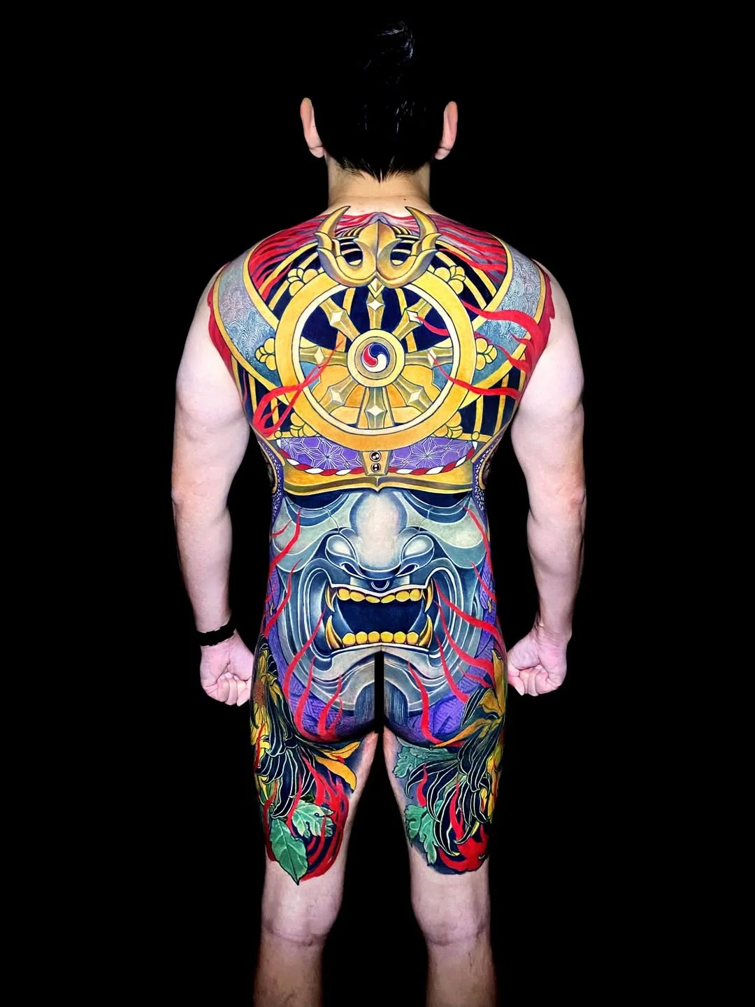 Japanese tattoo by Jess Yen: samurai helmet, demon face, dragon, flowers