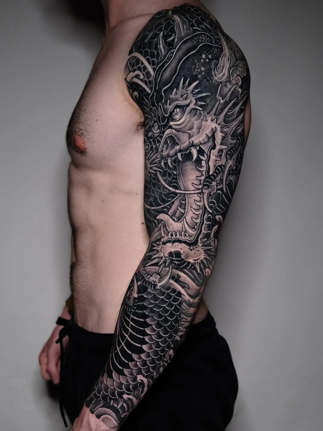 Japanese tattoo by Jess Yen: dragon, scales, claws, fire
