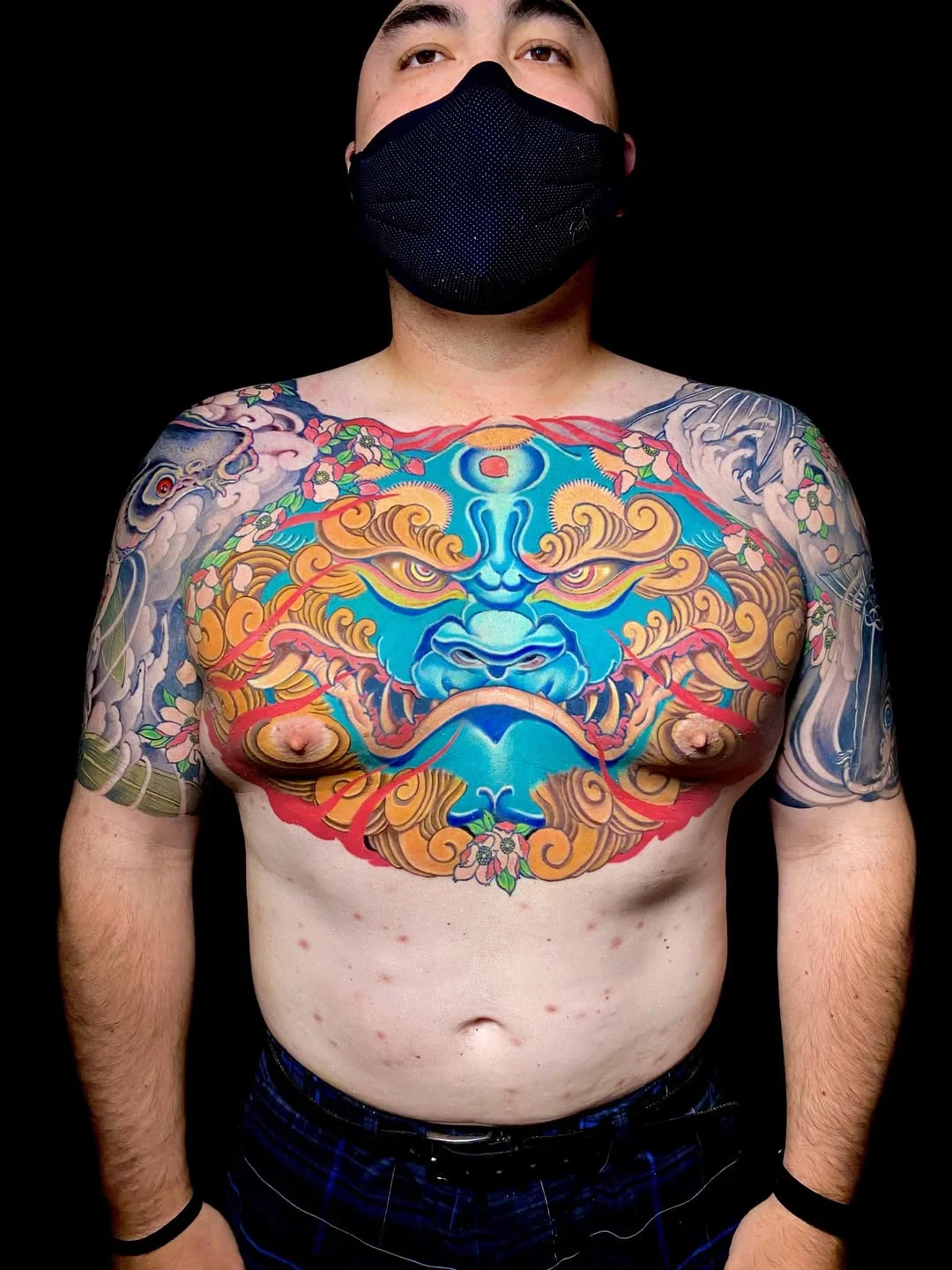 Japanese tattoo by Jess Yen: foo dog, flowers, clouds, leaves