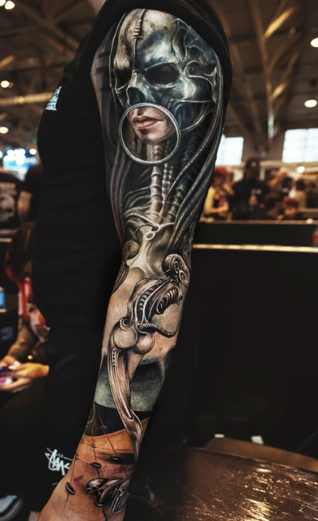Biomechanical tattoo by Yomico Moreno: skull, face, mechanical parts, bones