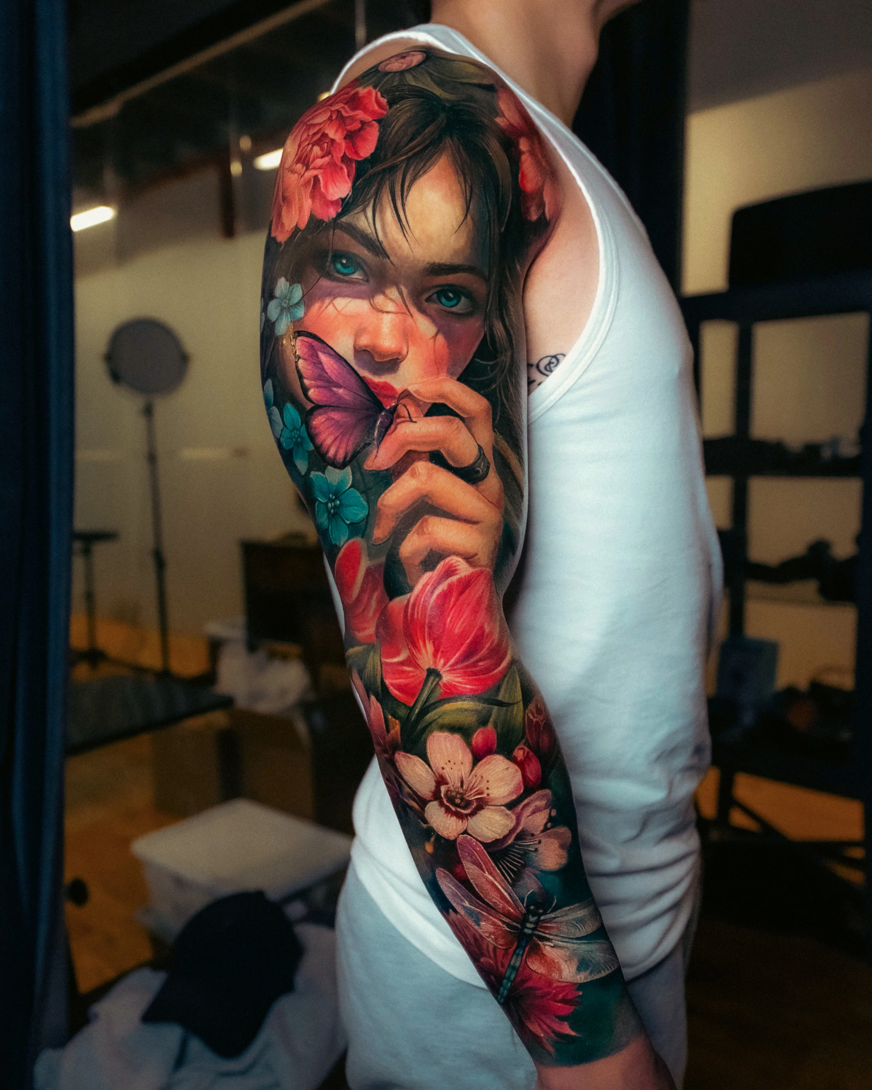 Color Realism tattoo by Yomico Moreno: woman, butterfly, flower, dragonfly