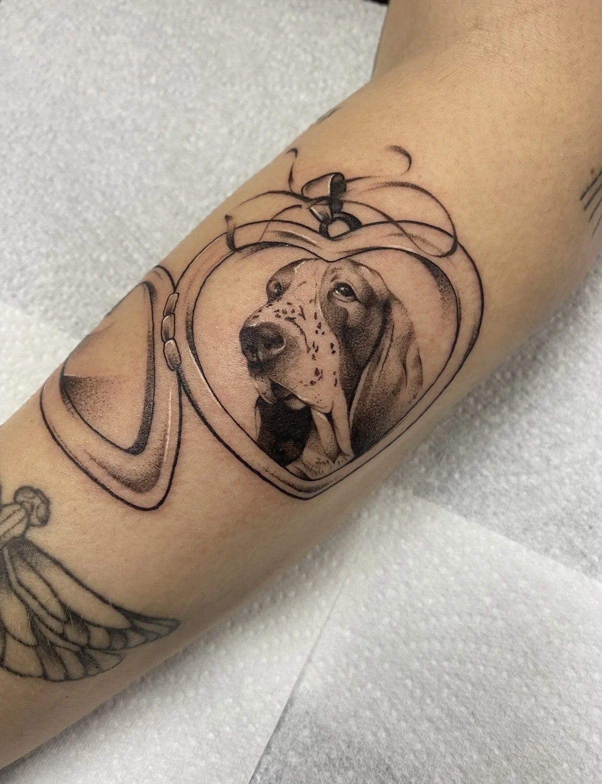 Black & Gray Realism tattoo by Aliye Gaygusuz: dog, heart-shaped locket, animal, portrait