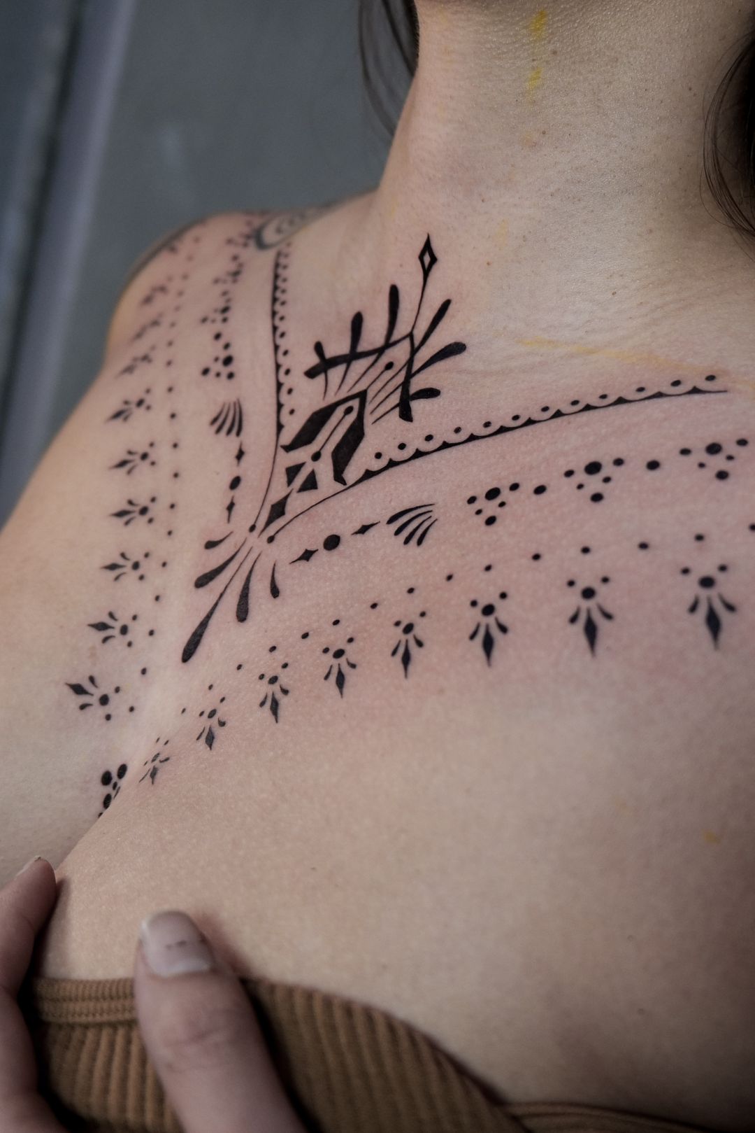 Blackwork tattoo by Sherri Anne Austria: abstract shapes, dots, lines, abstract