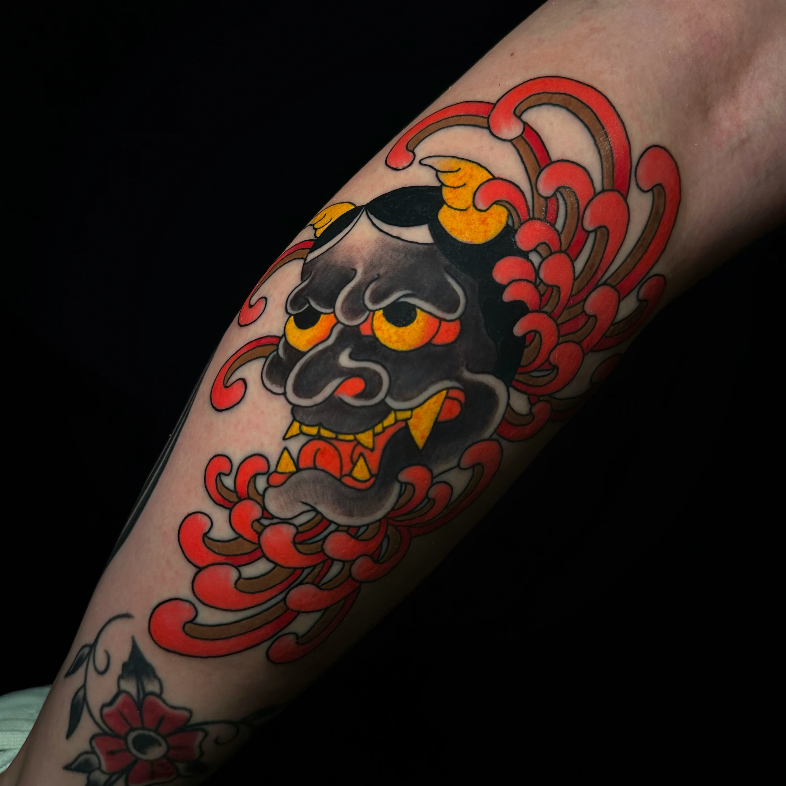Traditional tattoo by Alessio Ventimiglia: oni mask, horns, flames, mythology