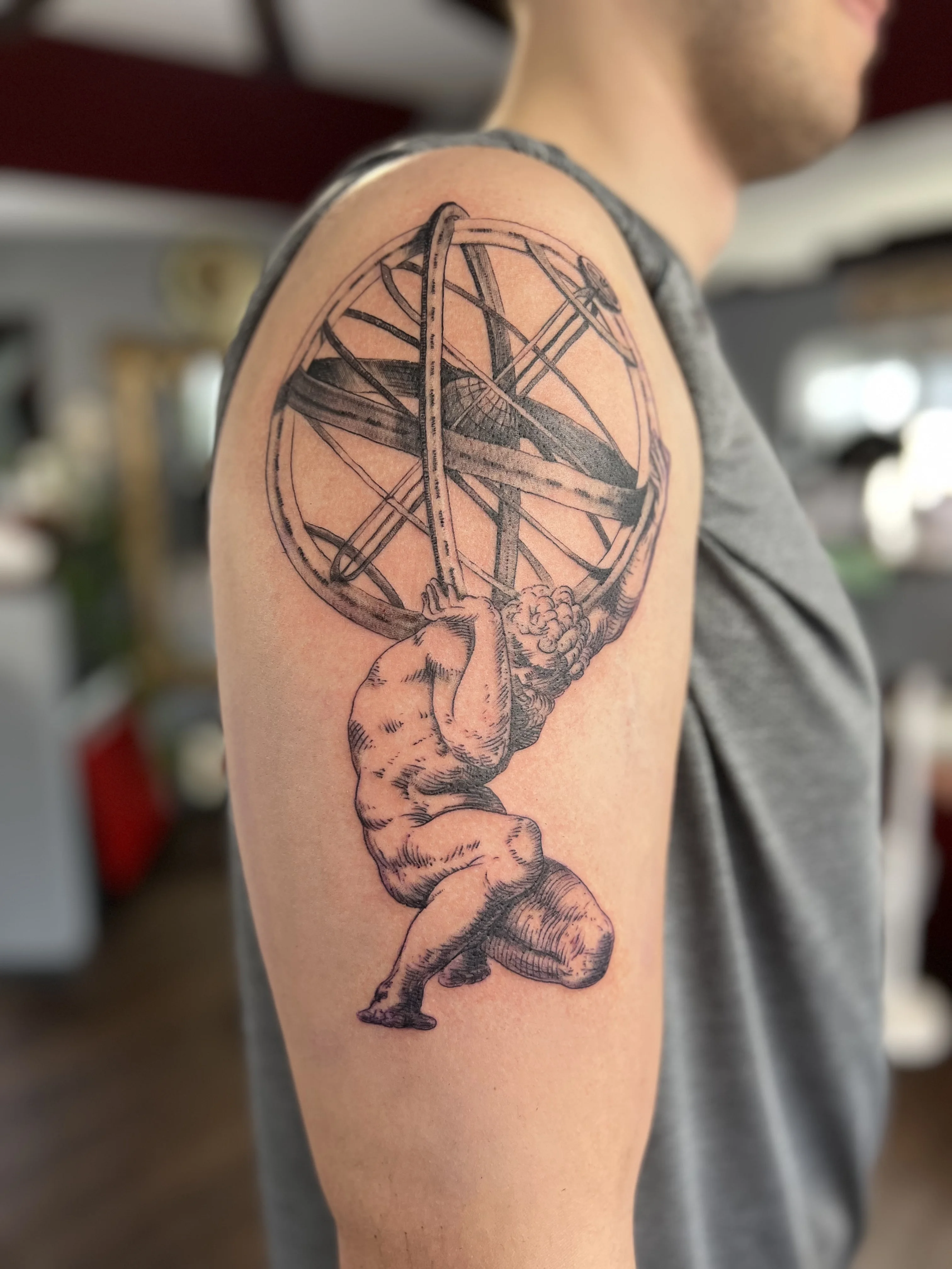 Black & Gray Realism tattoo by Justin Wilson: atlas, globe, human figure, mythology