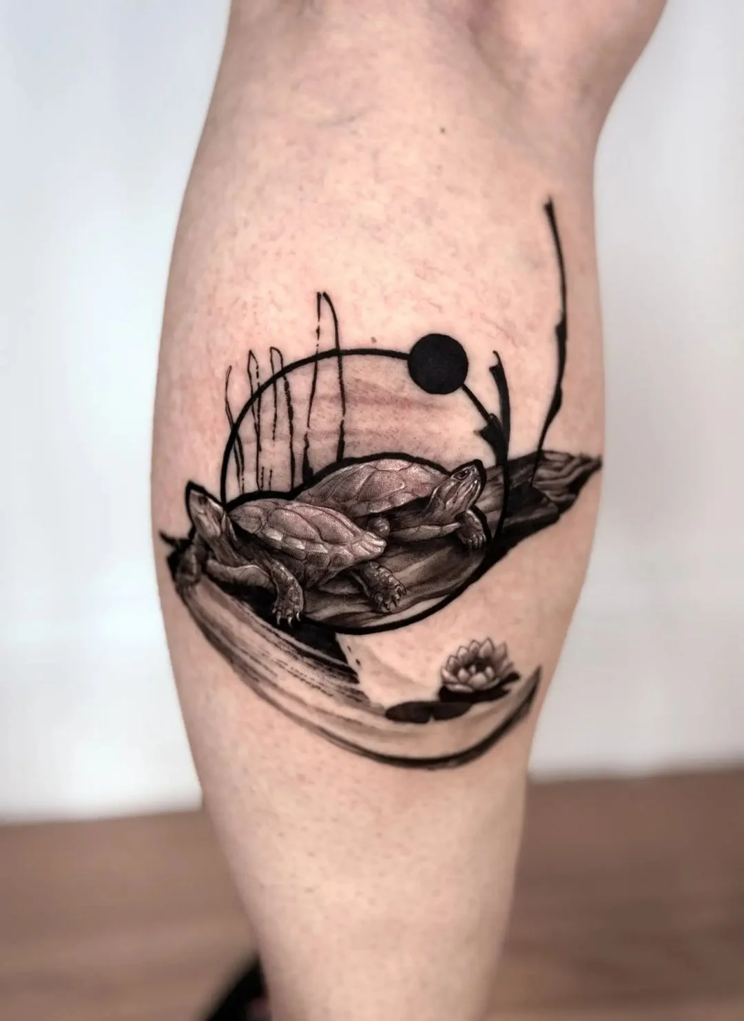 Black & Gray Realism tattoo by Jerrra Blues: turtle, log, water lily, sun