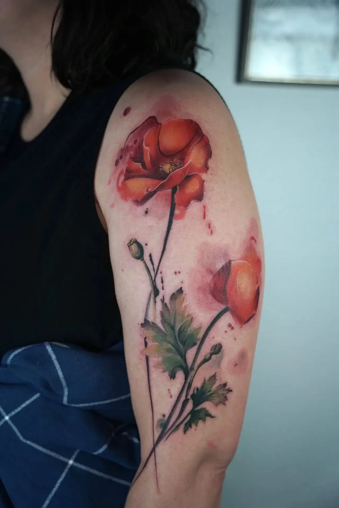Watercolor tattoo by Jerrra Blues: poppy flower, poppy bud, leaves, floral