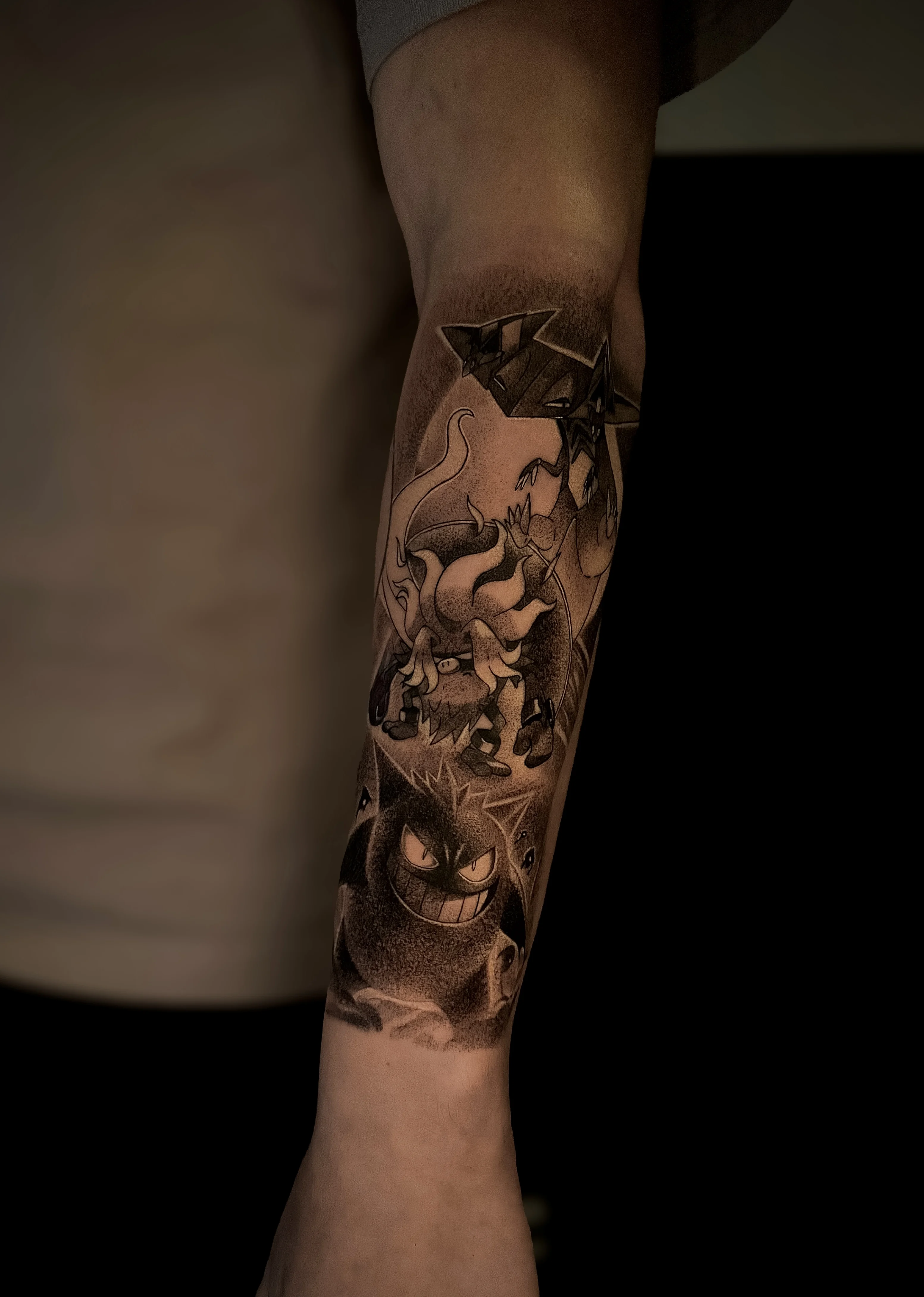 Anime tattoo by tattoo.naz777: character with flaming hair, large ghostly figure, menacing creature with grin, dark