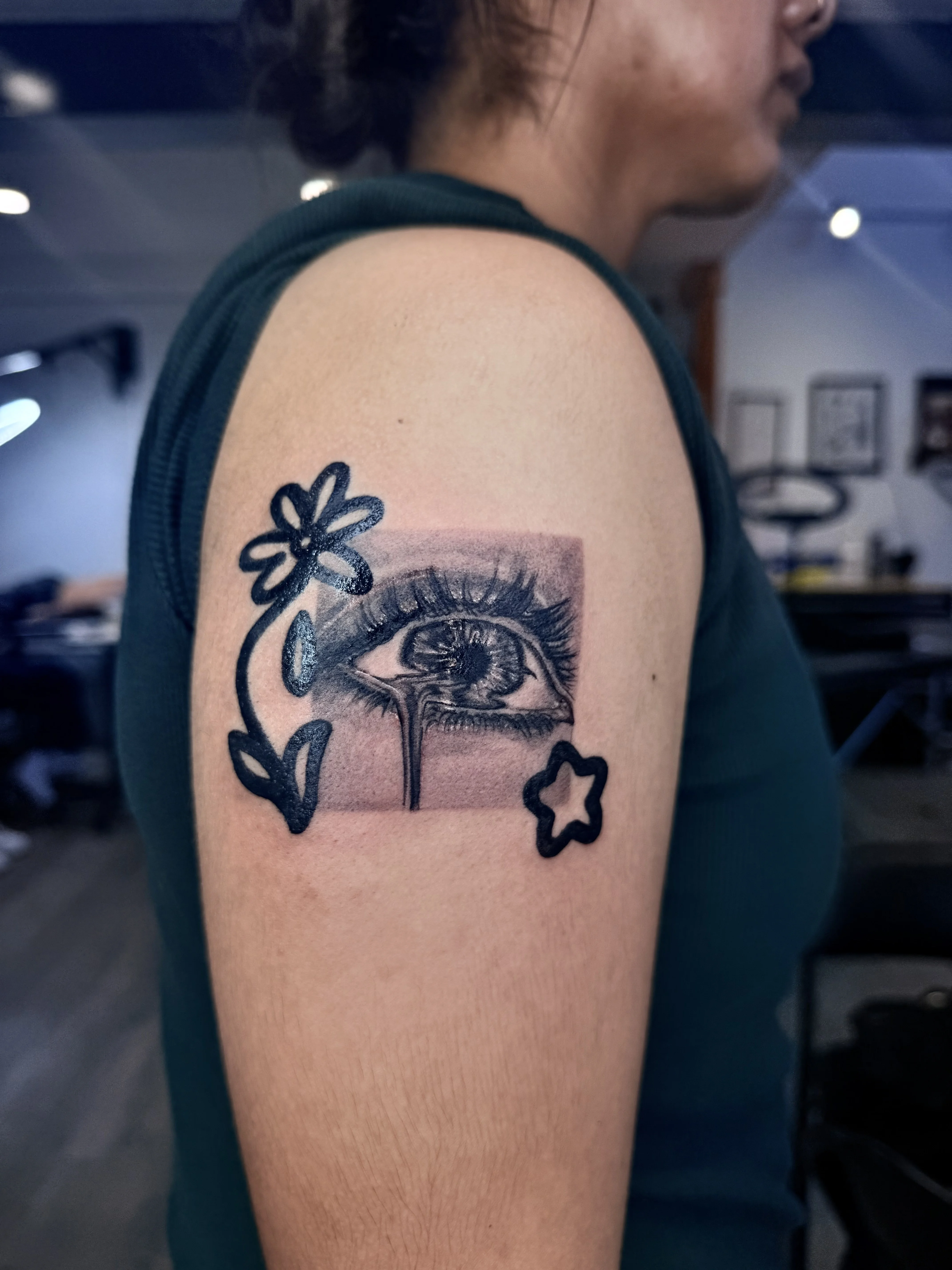Black & Gray Realism tattoo by Churry Tattoos: eye, tear, flower, leaf