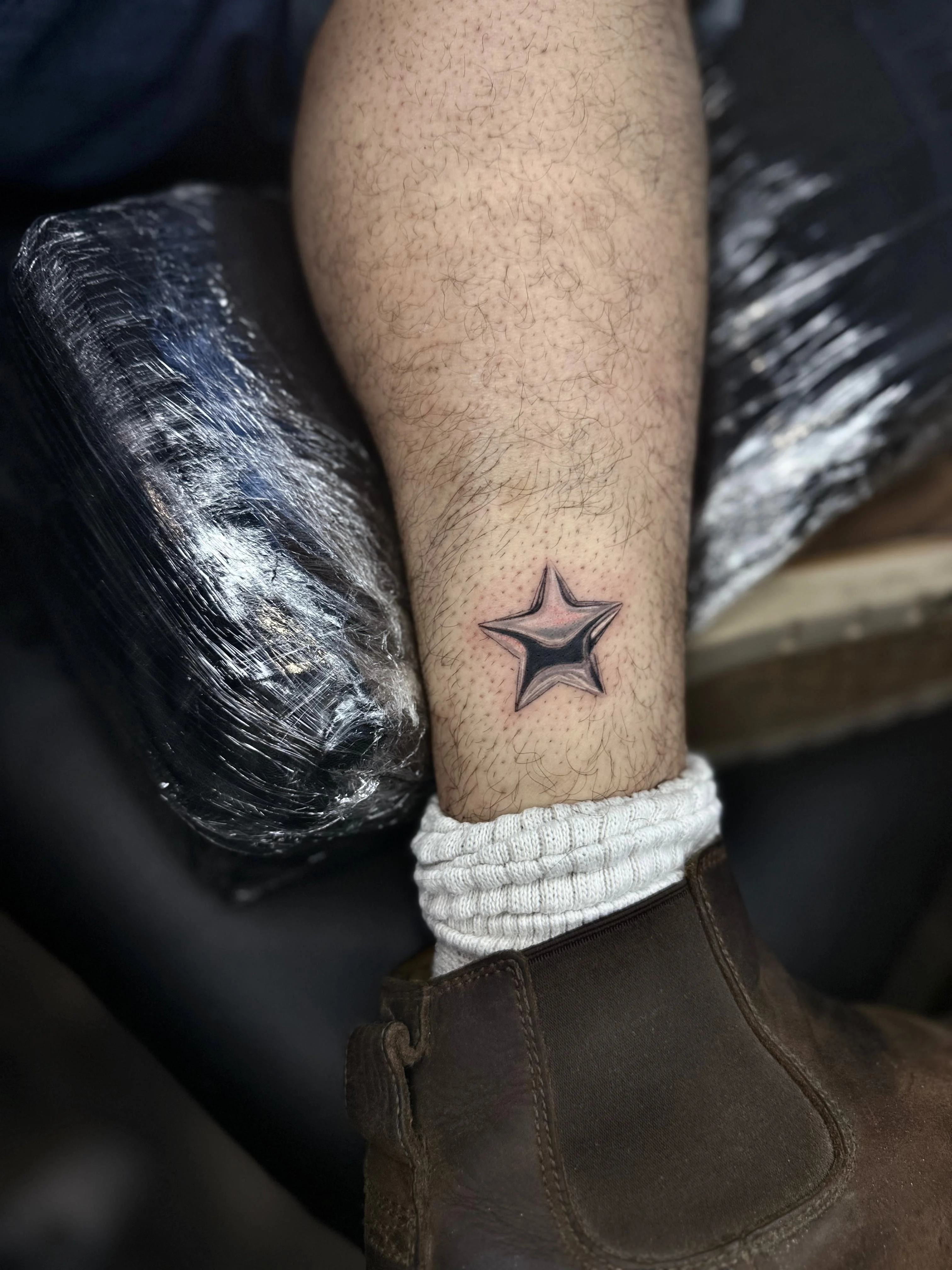 Black & Gray Realism tattoo by Churry Tattoos: star, minimalist, geometry, symbolic