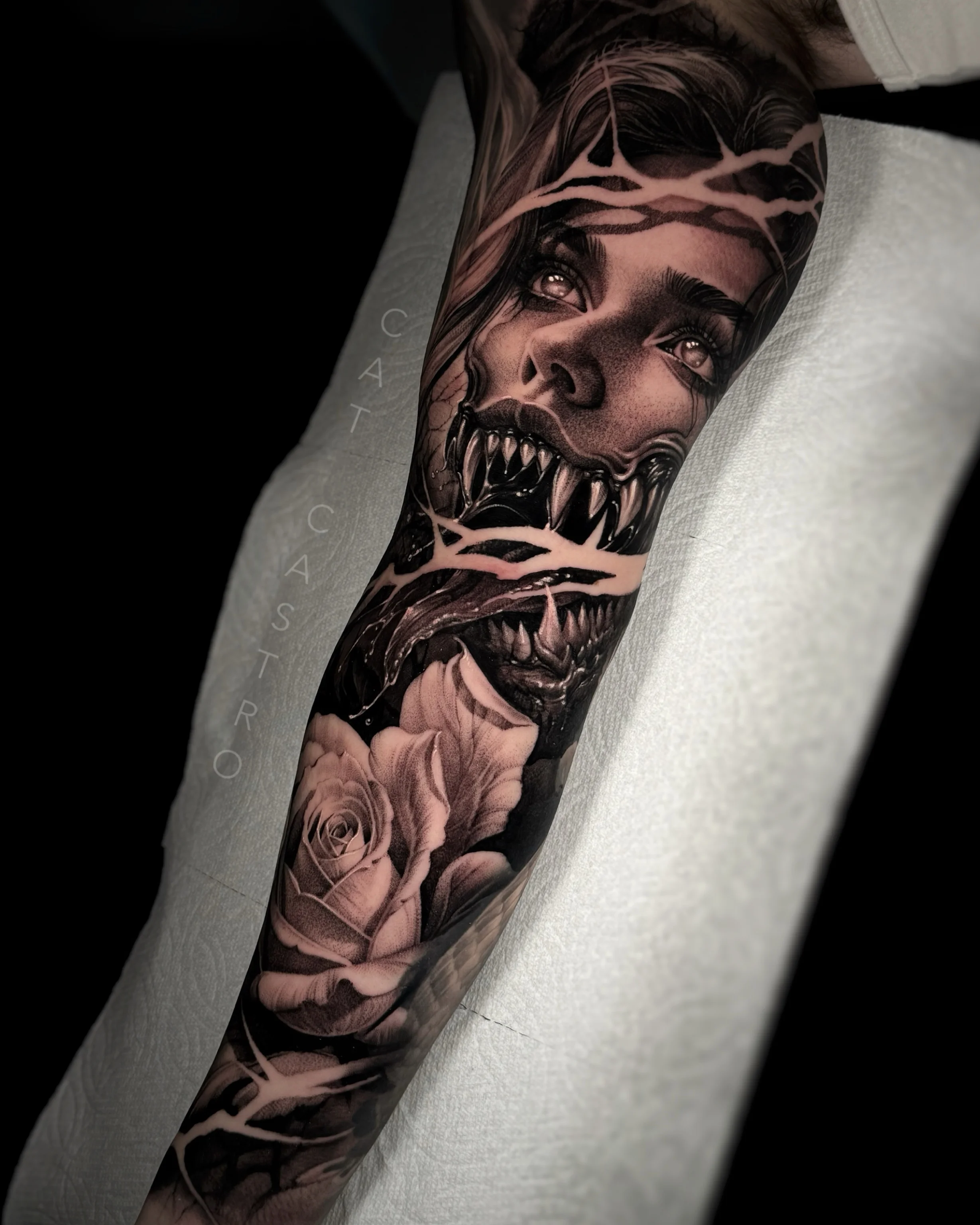 Black & Gray Realism tattoo by Cat Castro: woman, monster mouth, sharp teeth, rose