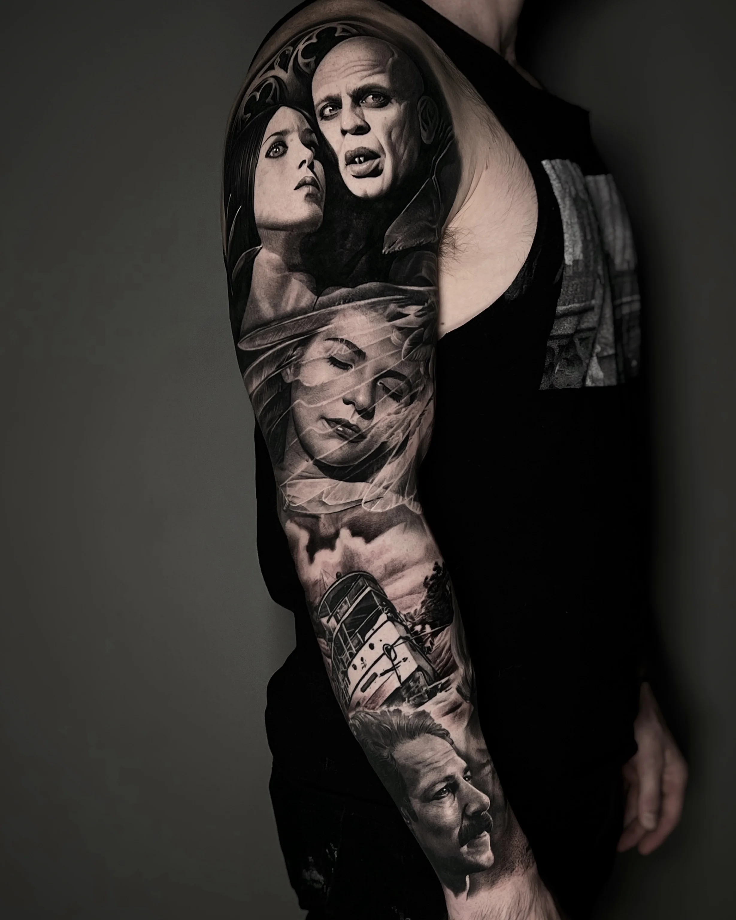 Black & Gray Realism tattoo by Cat Castro: woman, man, portrait, train