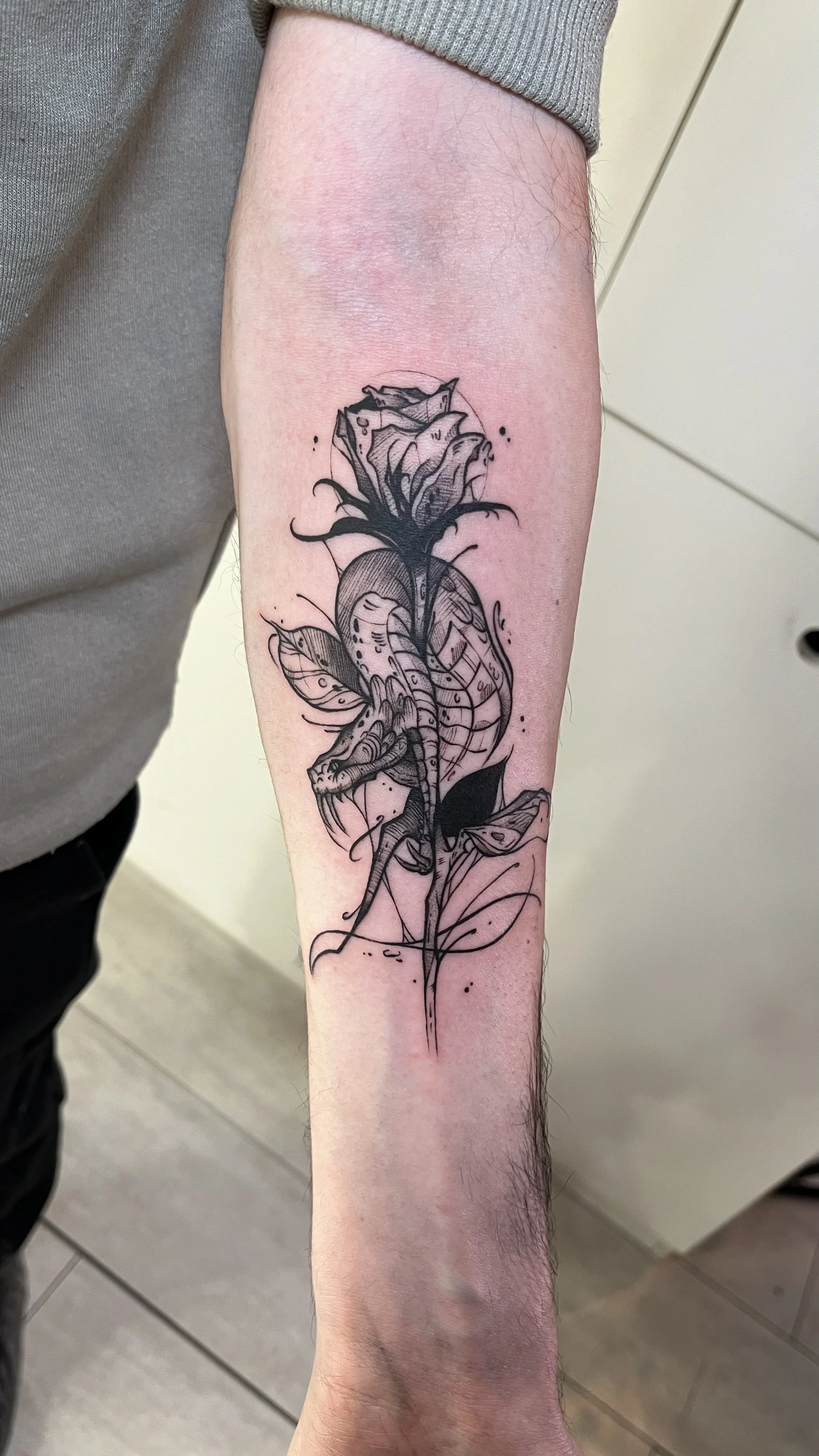 Fine Line tattoo by Kerasu: flower, snake, leaves, nature