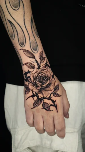 Realistic Rose Hand Tattoo