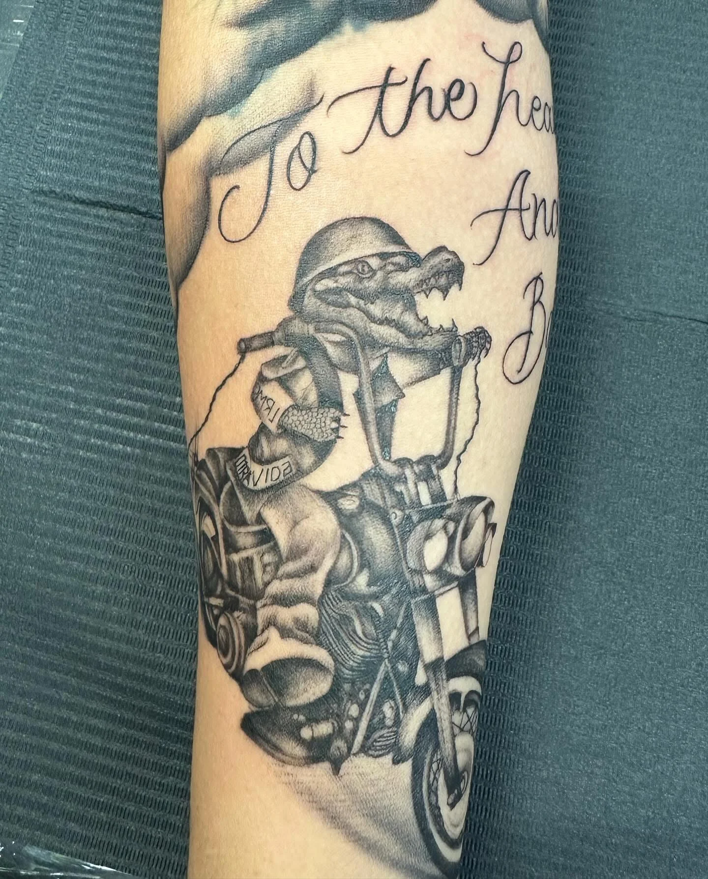 Alligator Riding Motorcycle Forearm: alligator, motorcycle, helmet, jacket, boots, animal