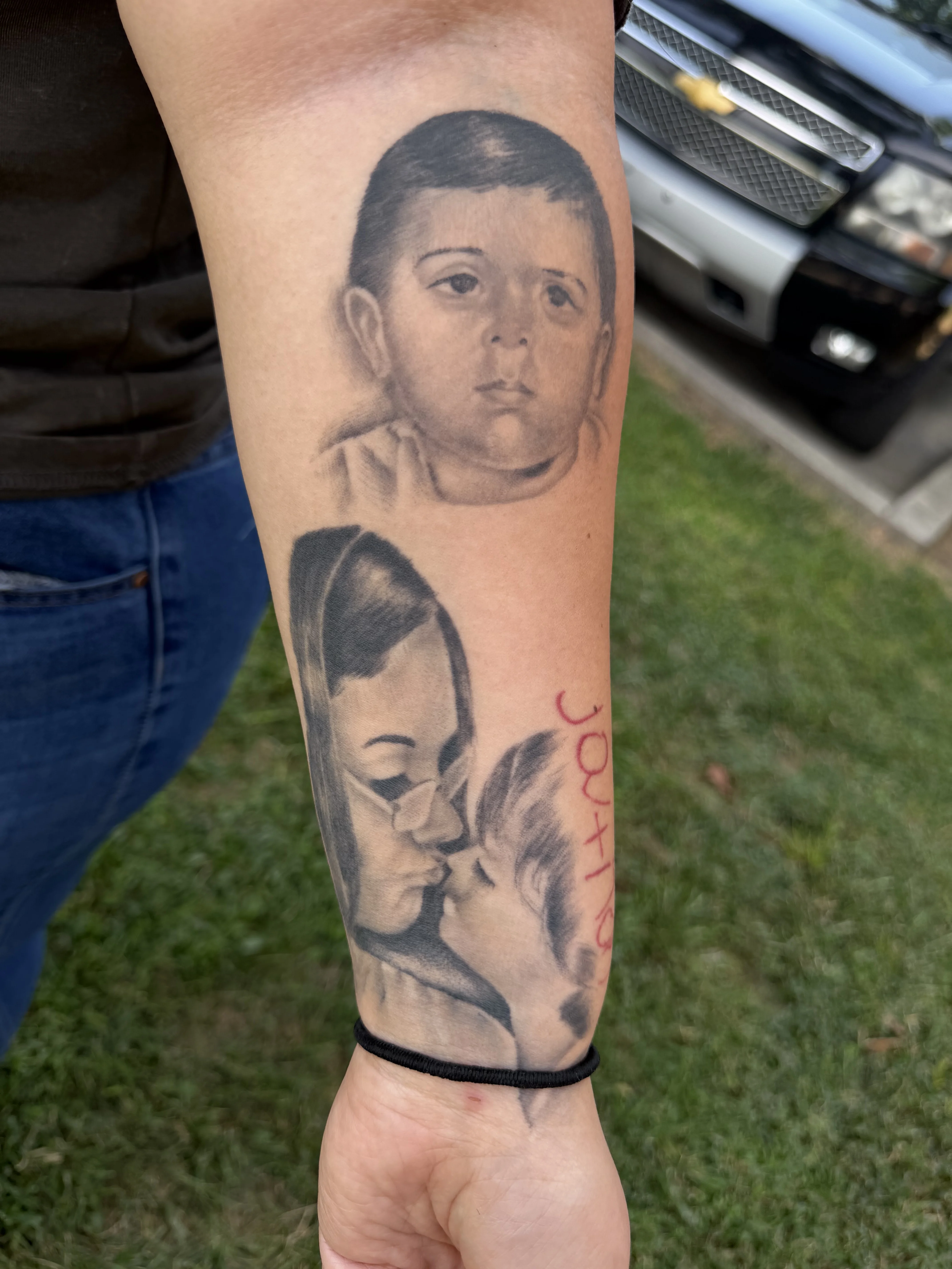 Black & Gray Realism tattoo by Bumpy Munoz: child portrait, mother, child kissing, face