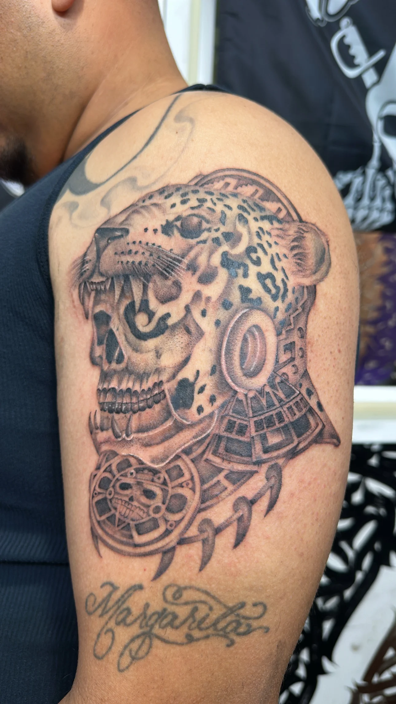 Black & Gray Realism tattoo by Bumpy Munoz: leopard, skull, jaguar head, necklace