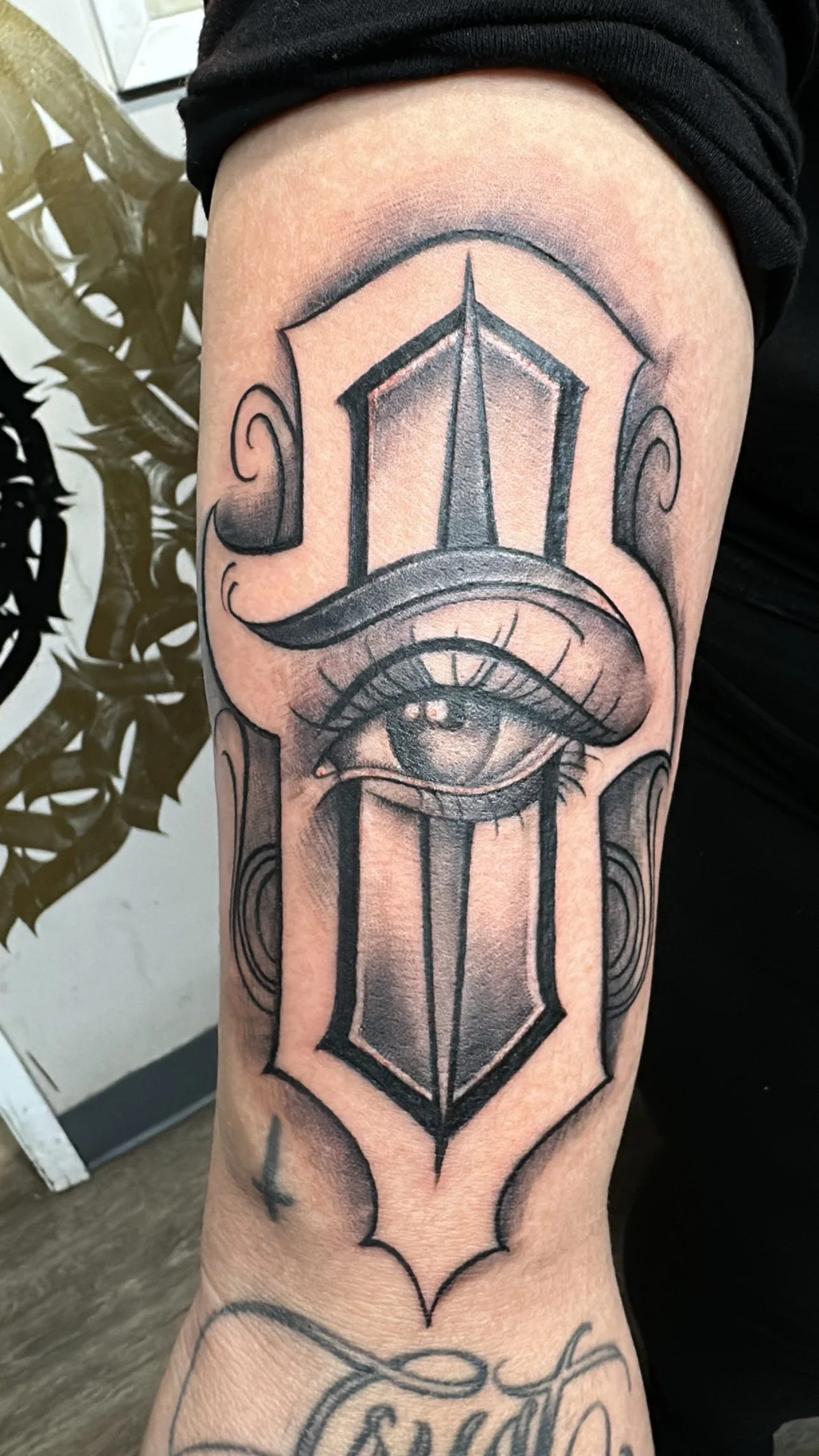 Black & Gray Realism tattoo by Bumpy Munoz: eye, decorative frame, abstract shapes, abstract