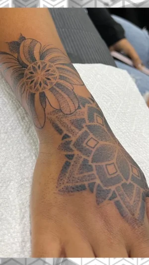 Mandala and Flower Hand Tattoo