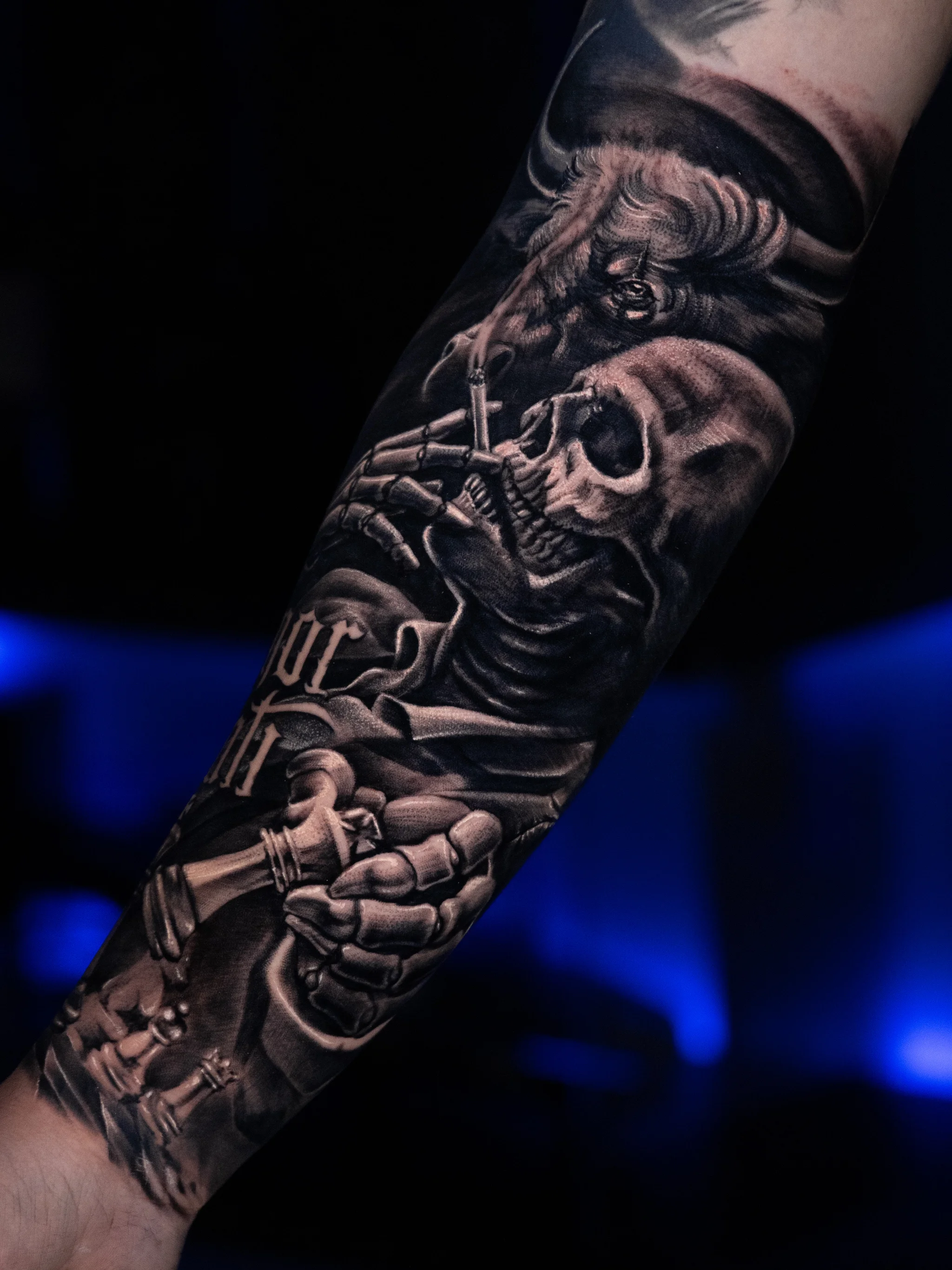 Black & Gray Realism tattoo by T-GRAN Ink: skull, skeleton hand, cigarette, chess pieces