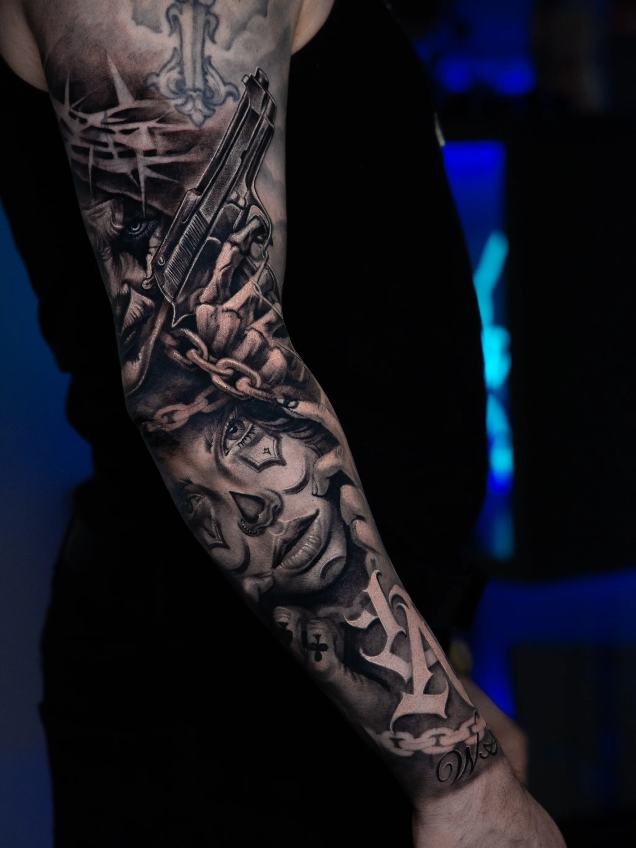 Black & Gray Realism tattoo by T-GRAN Ink: woman, gun, chains, cross