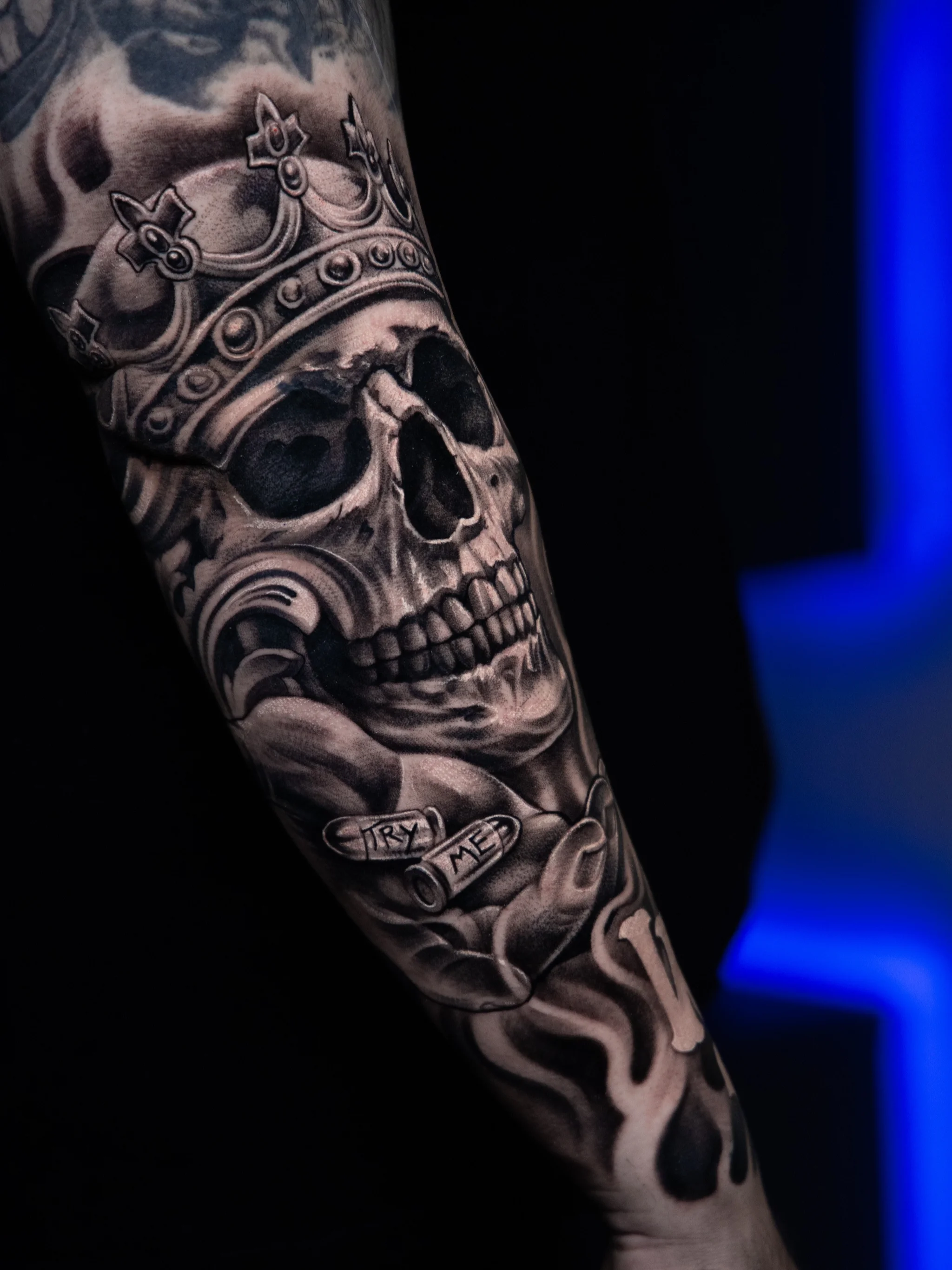 Black & Gray Realism tattoo by T-GRAN Ink: skull, crown, hand, bullet