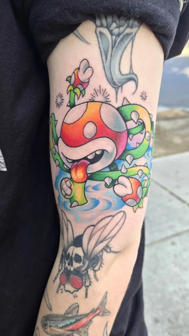 New School tattoo by Dominic_Mata: piranha plant, piranha plant buds, tongue, nature