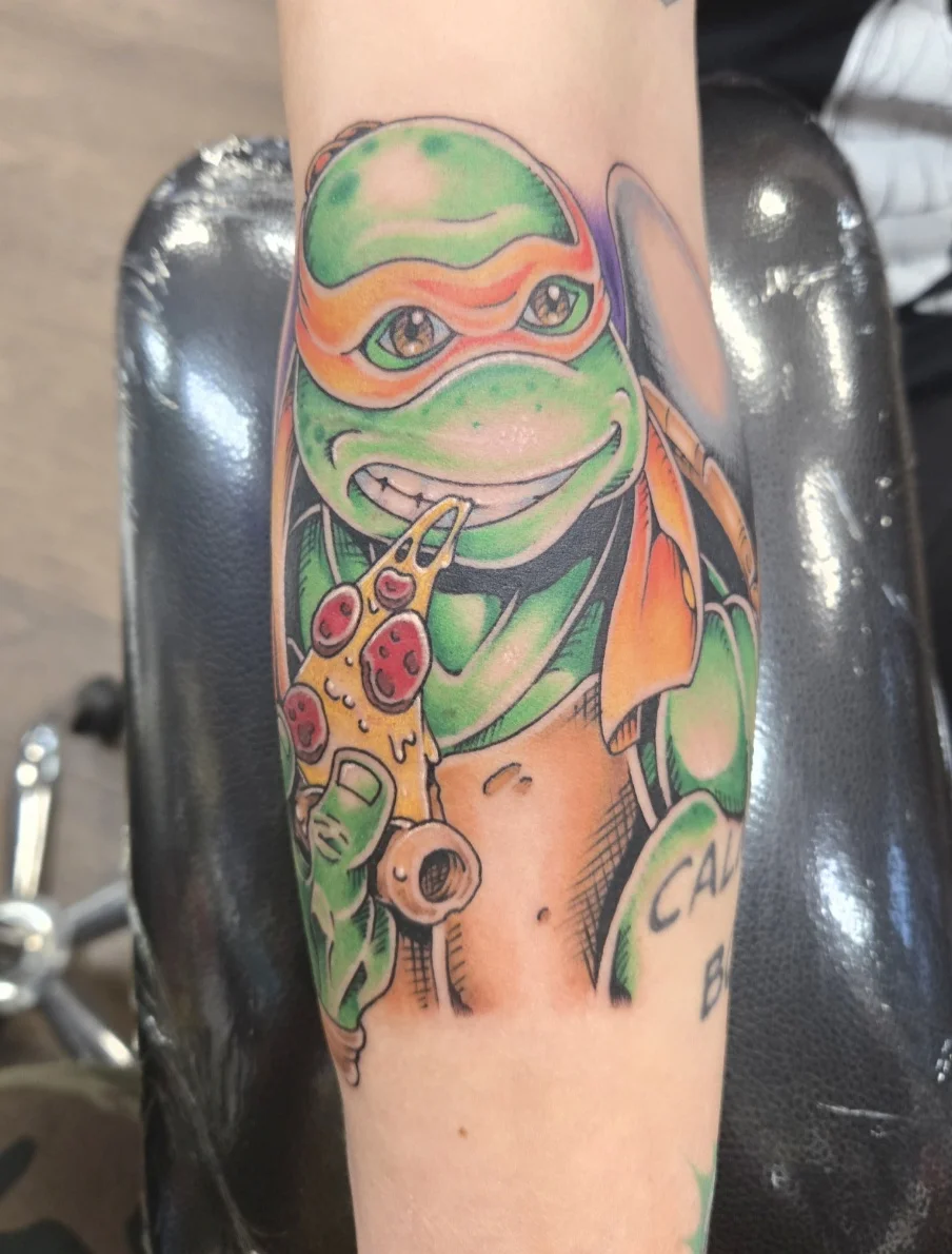 Ninja Turtle Eating Pizza Forearm: ninja turtle, pizza slice, mask, shell, pop culture, cartoon
